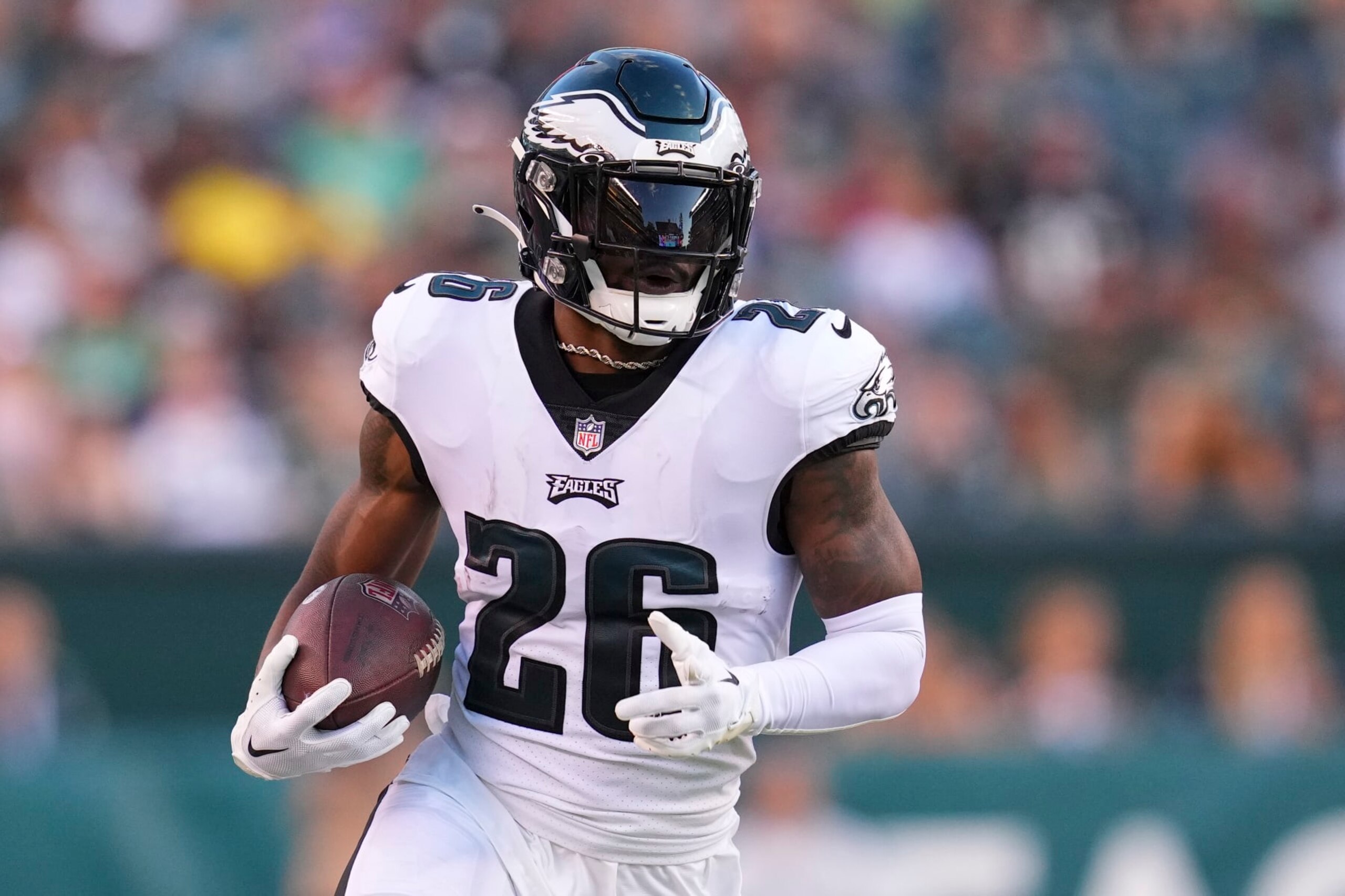 PHILADELPHIA, PA - AUGUST 12: Miles Sanders #26 of the Philadelphia Eagles runs with the ball against the New York Jets during the preseason game at Lincoln Financial Field on August 12, 2022 in Philadelphia, Pennsylvania. The Jets defeated the Eagles 24-21. (Photo by Mitchell Leff/Getty Images)