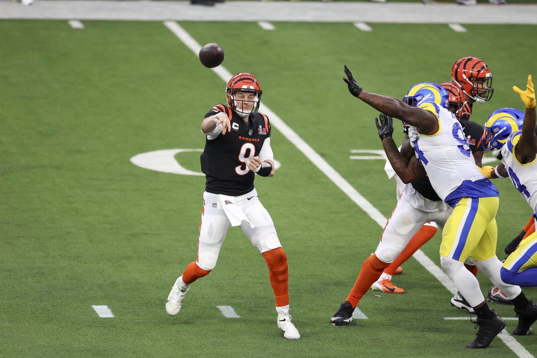 INGLEWOOD, CALIFORNIA - FEBRUARY 13: Joe Burrow #9 of the Cincinnati Bengals passes against the Los Angeles Rams during the NFL Super Bowl 56 football game at SoFi Stadium on February 13, 2022 in Inglewood, California. The Rams won 23-20. (Photo by Michael Owens/Getty Images)
