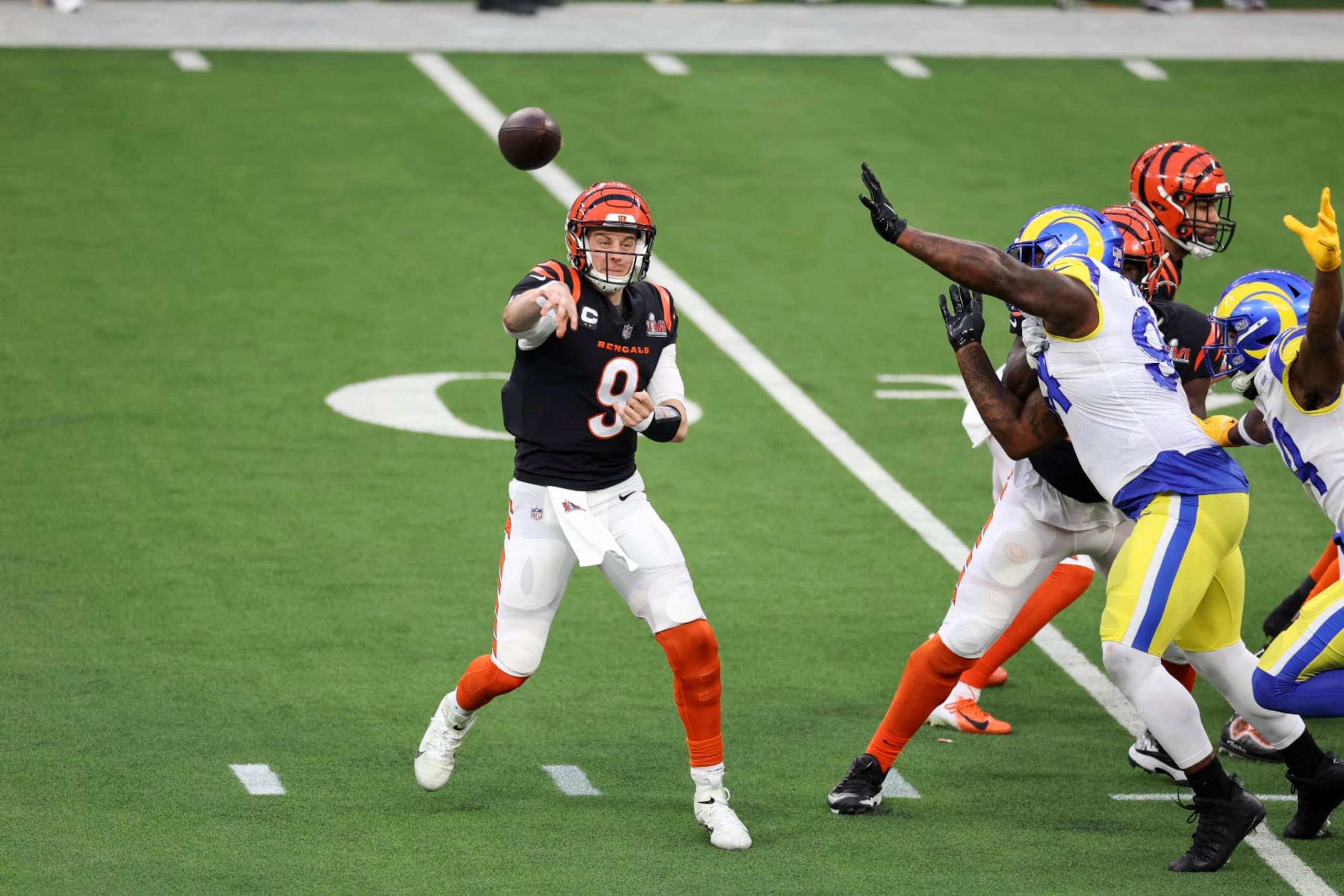 INGLEWOOD, CALIFORNIA - FEBRUARY 13: Joe Burrow #9 of the Cincinnati Bengals passes against the Los Angeles Rams during the NFL Super Bowl 56 football game at SoFi Stadium on February 13, 2022 in Inglewood, California. The Rams won 23-20. (Photo by Michael Owens/Getty Images) INGLEWOOD, CALIFORNIA - FEBRUARY 13: Joe Burrow #9 of the Cincinnati Bengals passes against the Los Angeles Rams during the NFL Super Bowl 56 football game at SoFi Stadium on February 13, 2022 in Inglewood, California. The Rams won 23-20. (Photo by Michael Owens/Getty Images)