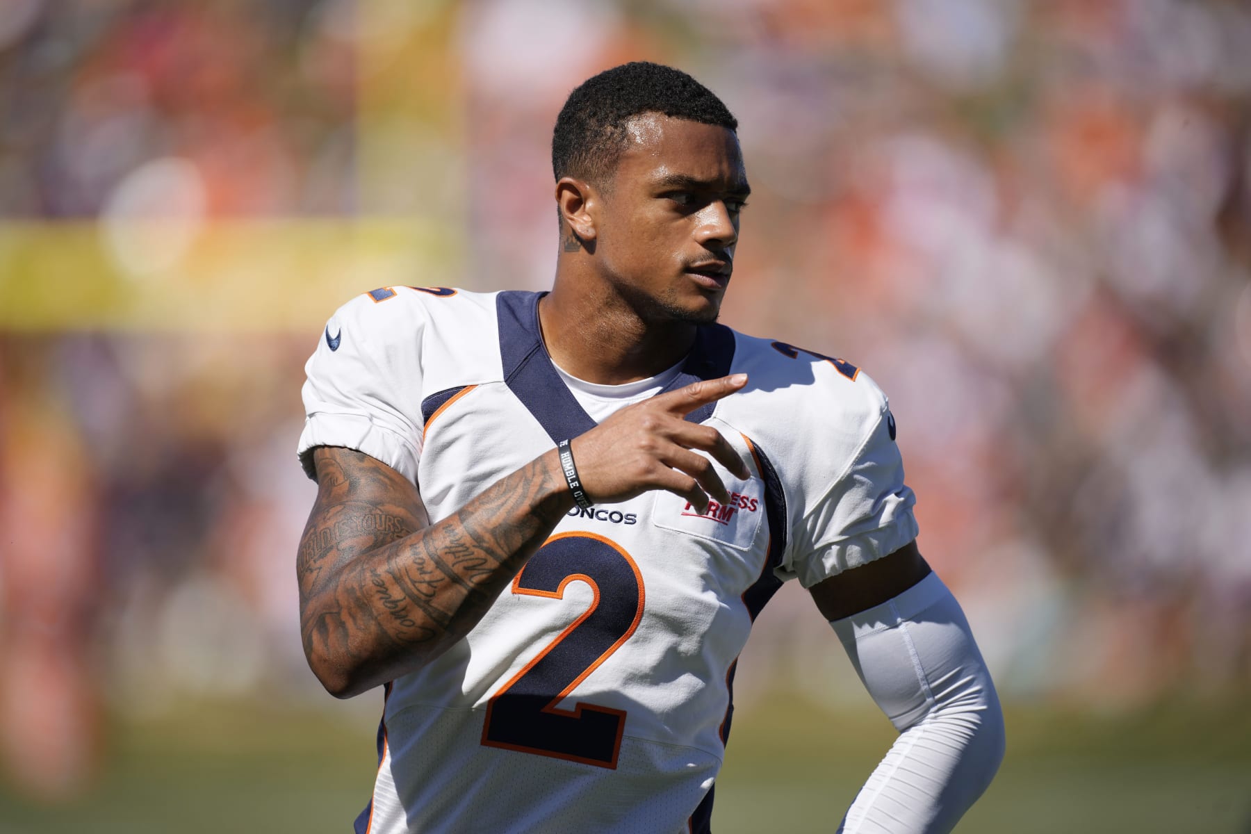 Denver Broncos cornerback Patrick Surtain II takes part in drills during the NFL football team's training camp Saturday, Aug. 6, 2022, at the Broncos' headquarters in Centennial, Colo. (AP Photo/David Zalubowski)