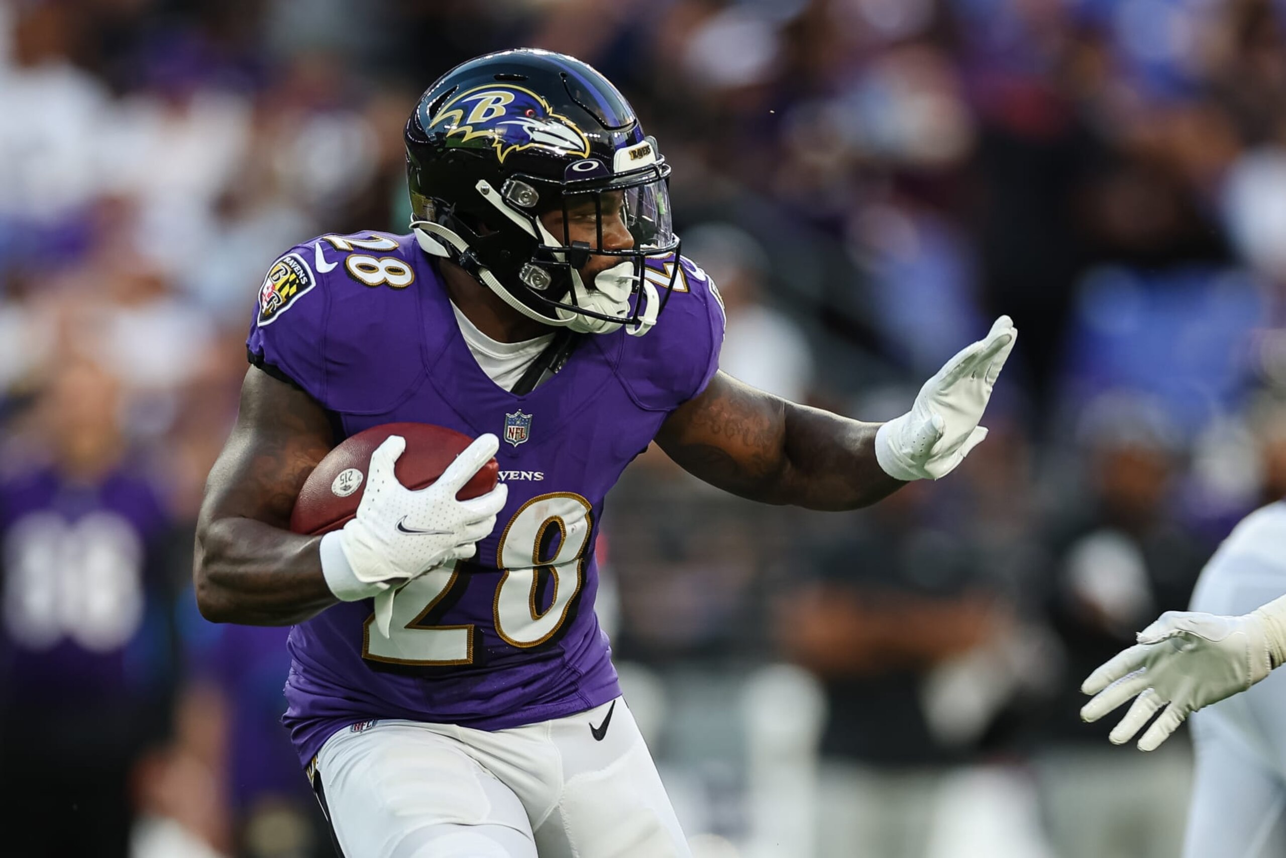 BALTIMORE, MD - AUGUST 27: Mike Davis #28 of the Baltimore Ravens carries the ball against the Washington Commanders during the first half of a preseason game at M&T Bank Stadium on August 27, 2022 in Baltimore, Maryland. (Photo by Scott Taetsch/Getty Images) BALTIMORE, MD - AUGUST 27: Mike Davis #28 of the Baltimore Ravens carries the ball against the Washington Commanders during the first half of a preseason game at M&T Bank Stadium on August 27, 2022 in Baltimore, Maryland. (Photo by Scott Taetsch/Getty Images)