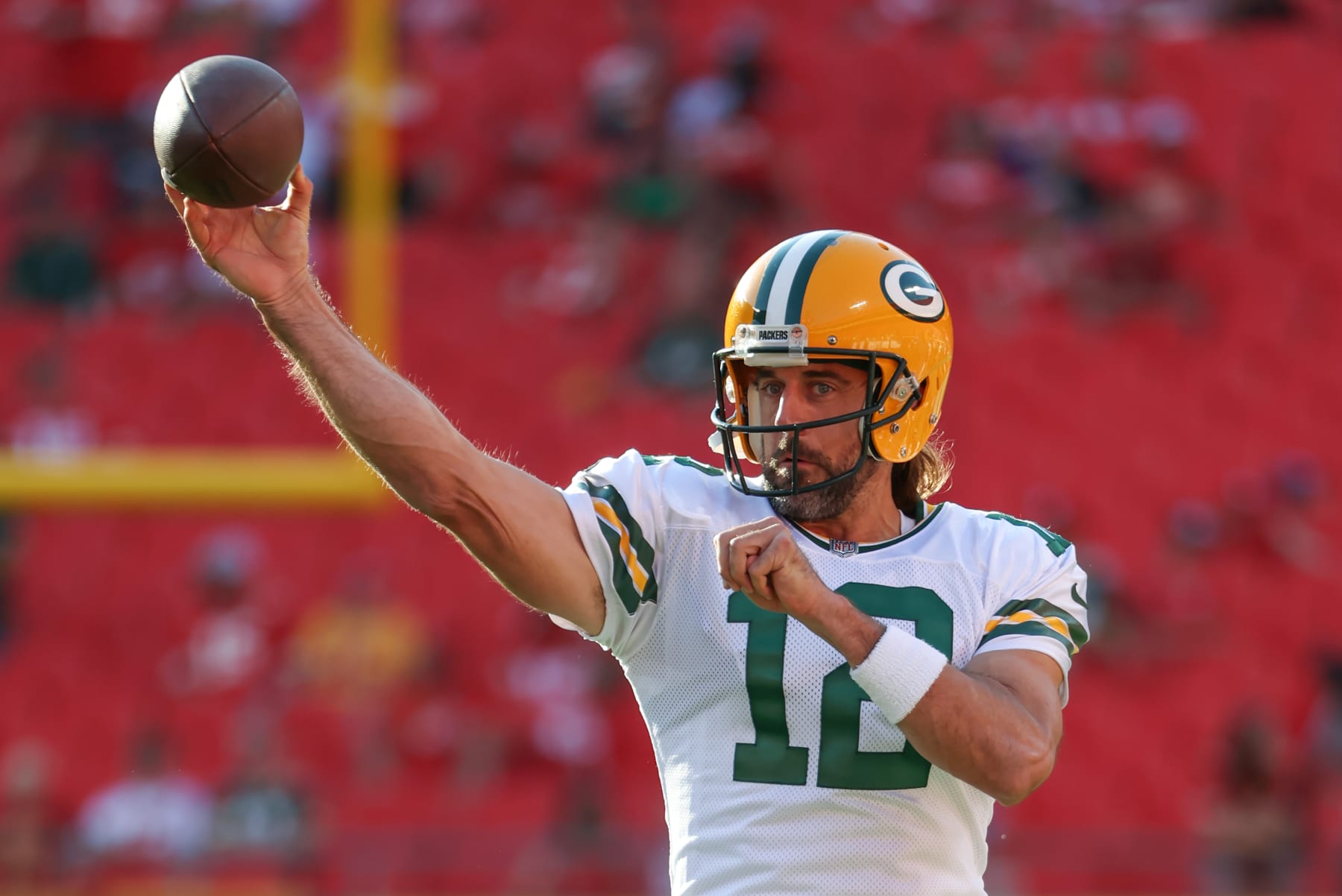 KANSAS CITY, MO - AUGUST 25: Green Bay Packers quarterback Aaron Rodgers (12) throws a pass before an NFL preseason game between the Green Bay Packers and Kansas City Chiefs on August 25, 2022 at GEHA Field at Arrowhead Stadium in Kansas City, MO. (Photo by Scott Winters/Icon Sportswire via Getty Images)