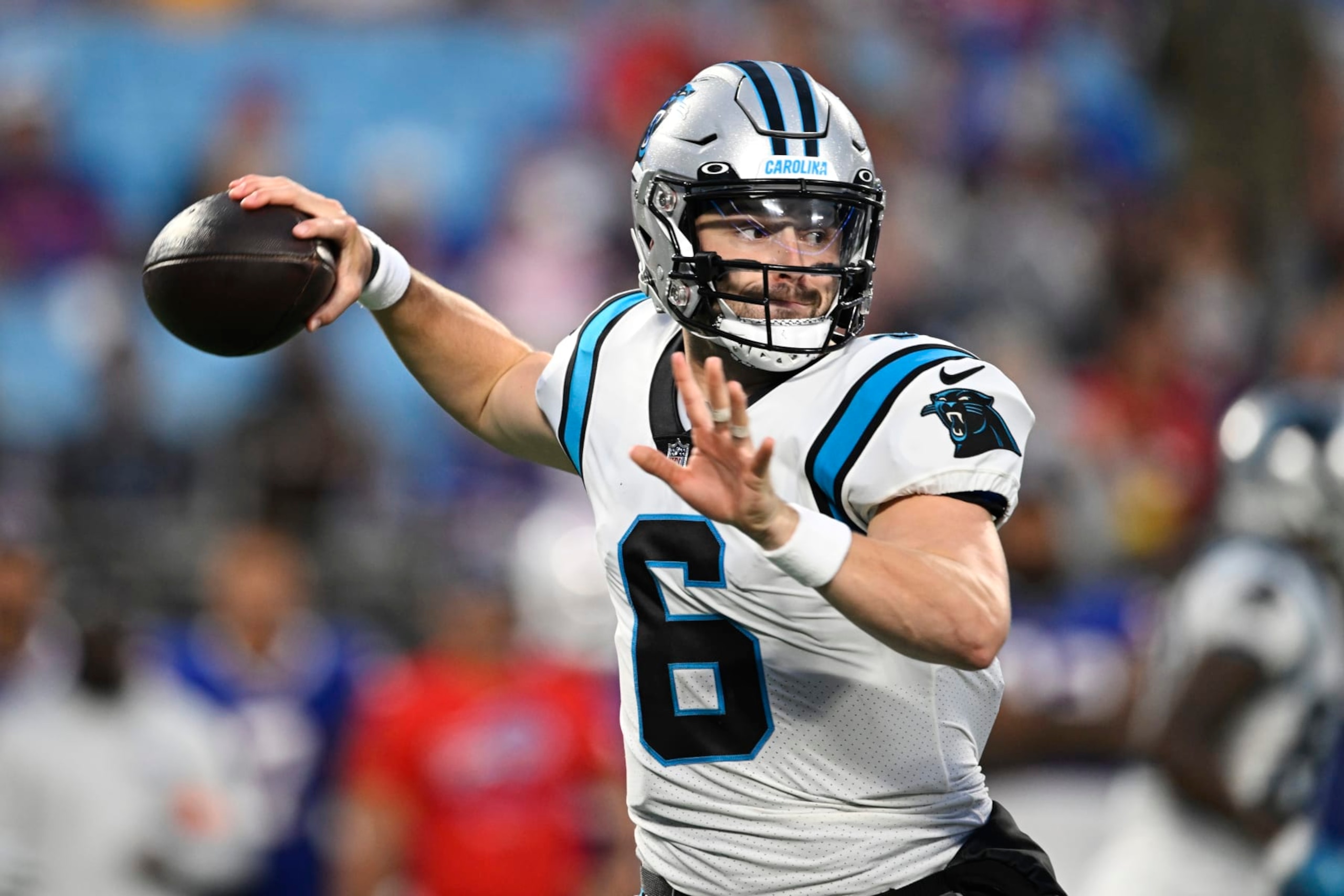 CHARLOTTE, NORTH CAROLINA - AUGUST 26: Baker Mayfield #6 of the Carolina Panthers throws a pass in the first quarter against the Buffalo Bills during a preseason game at Bank of America Stadium on August 26, 2022 in Charlotte, North Carolina. (Photo by Eakin Howard/Getty Images)