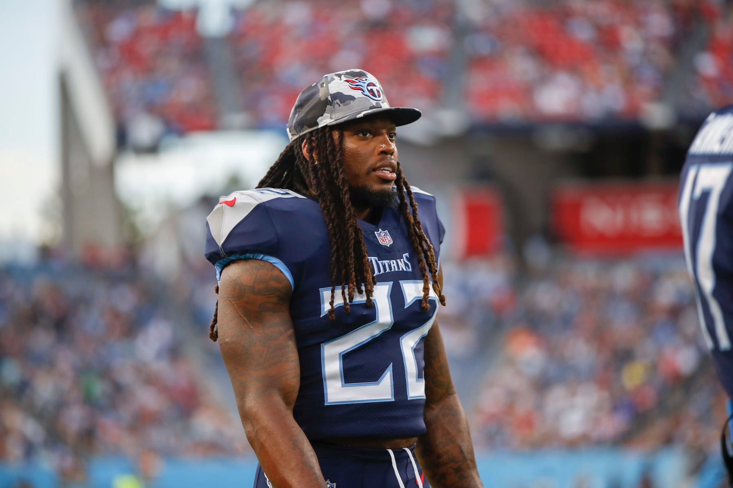 NASHVILLE, TENNESSEE - AUGUST 20: Derrick Henry #22 of the Tennessee Titans on the sidelines during the second quarter of the game with the Tampa Bay Buccaneers at Nissan Stadium on August 20, 2022 in Nashville, Tennessee. (Photo by Silas Walker/Getty Images)