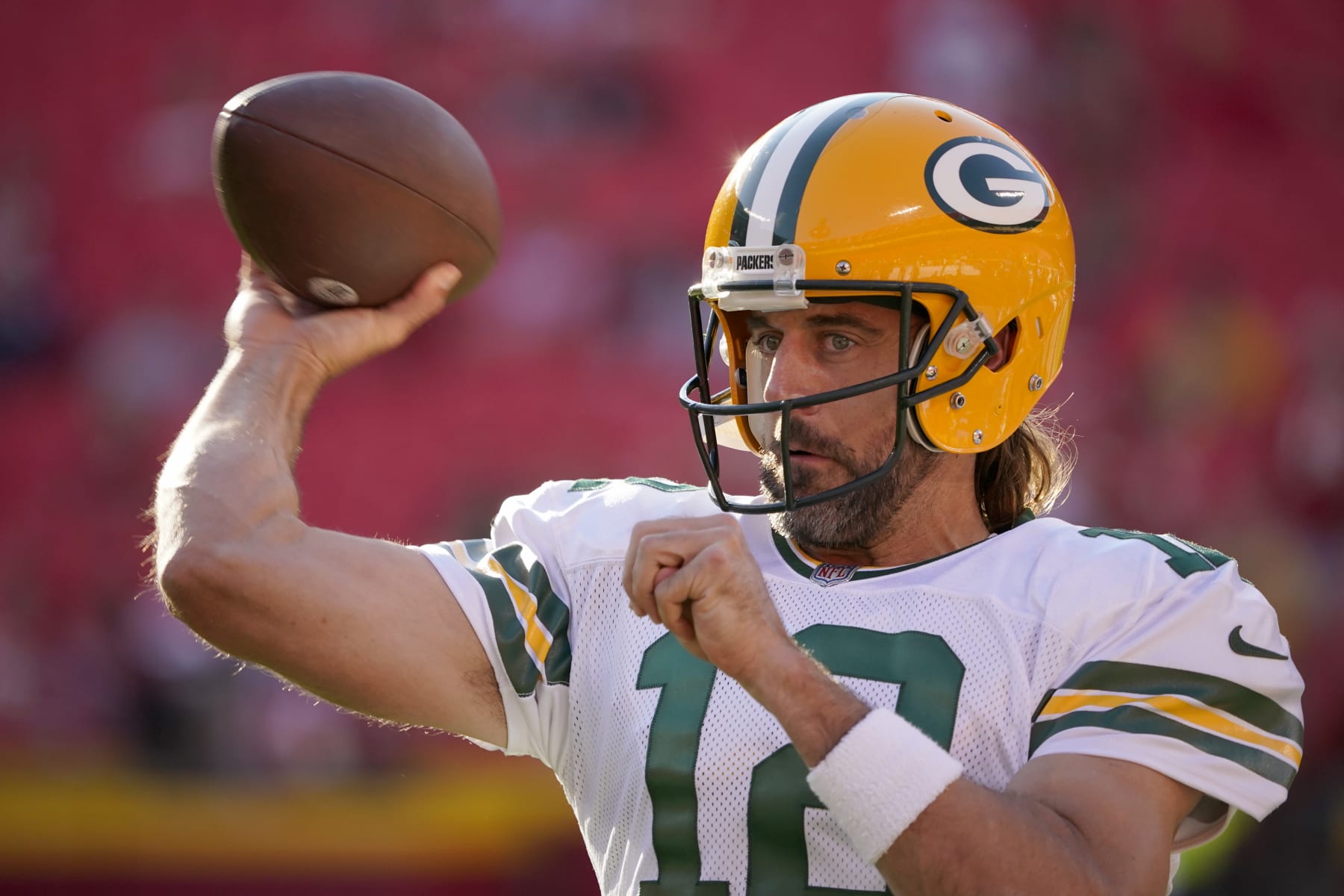 Green Bay Packers quarterback Aaron Rodgers warms up before the start of an NFL preseason football game between the Kansas City Chiefs and the Green Bay Packers Thursday, Aug. 25, 2022, in Kansas City, Mo. (AP Photo/Ed Zurga)