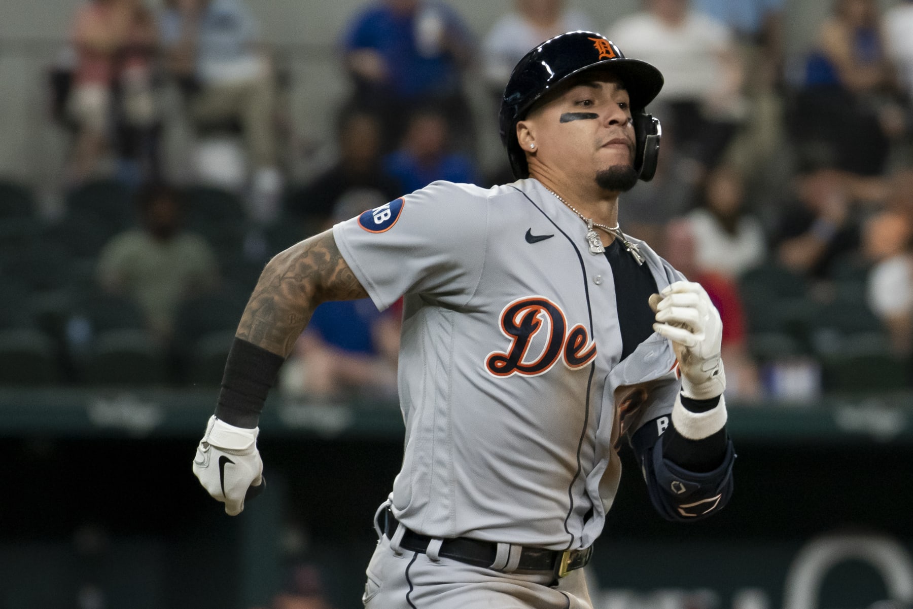 ARLINGTON, TEXAS - AUGUST 26: Javier Baez #28 of the Detroit Tigers sprints down the first base line to beat a throw against the Texas Rangers at Globe Life Field on August 26, 2022 in Arlington, Texas. (Photo by Emil Lippe/Getty Images)