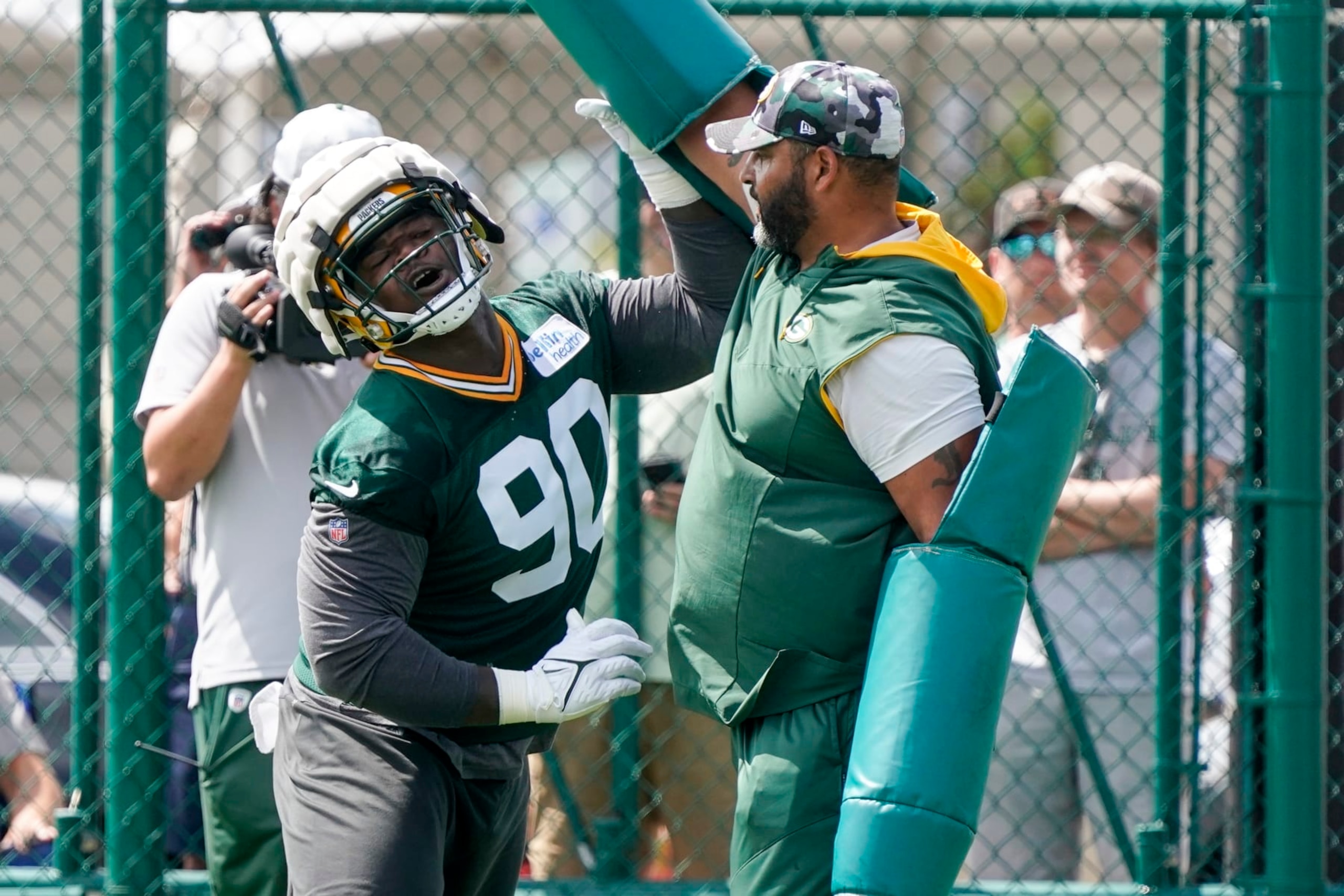 Green Bay Packers' Jarran Reed runs a drill at the NFL football team's practice field Wednesday, July 27, 2022, in Green Bay, Wis. (AP Photo/Morry Gash)