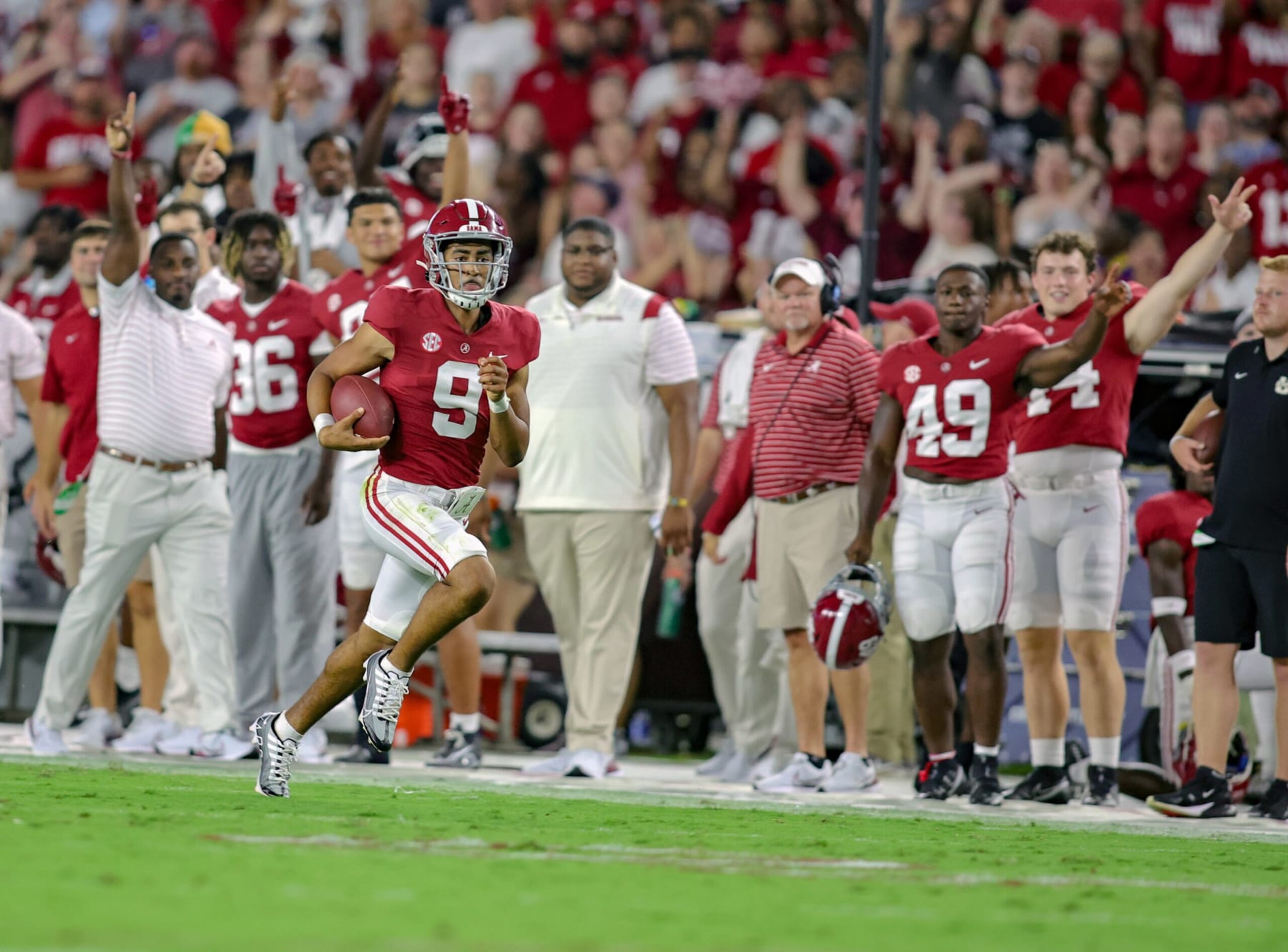 TUSCALOOSA, ALABAMA - SEPTEMBER 3: Bryce Young #9 of the Alabama Crimson Tide runs down the sideline during the first half against the Utah State Aggies at Bryant Denny Stadium on September 3, 2022 in Tuscaloosa, Alabama. (Photo by Brandon Sumrall/Getty Images) TUSCALOOSA, ALABAMA - SEPTEMBER 3: Bryce Young #9 of the Alabama Crimson Tide runs down the sideline during the first half against the Utah State Aggies at Bryant Denny Stadium on September 3, 2022 in Tuscaloosa, Alabama. (Photo by Brandon Sumrall/Getty Images)