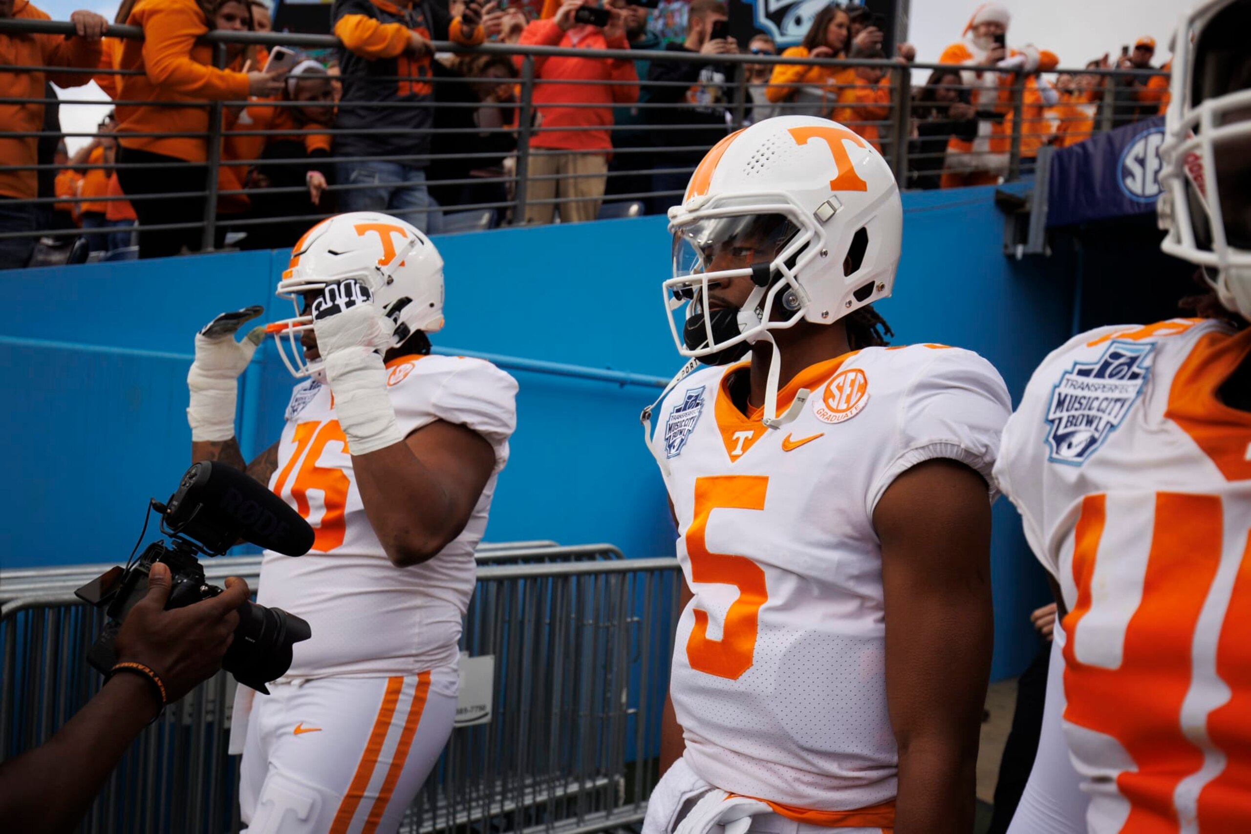 NASHVILLE, TN - DECEMBER 30: Hendon Hooker #5 of the Tennessee Volunteers walks out of the tunnel before the TransPerfect Music City Bowl against the Purdue Boilermakers at Nissan Stadium on December 30, 2021 in Nashville, Tennessee. Purdue defeats Tennessee 48-45 in overtime. (Photo by Brett Carlsen/Getty Images) NASHVILLE, TN - DECEMBER 30: Hendon Hooker #5 of the Tennessee Volunteers walks out of the tunnel before the TransPerfect Music City Bowl against the Purdue Boilermakers at Nissan Stadium on December 30, 2021 in Nashville, Tennessee. Purdue defeats Tennessee 48-45 in overtime. (Photo by Brett Carlsen/Getty Images)