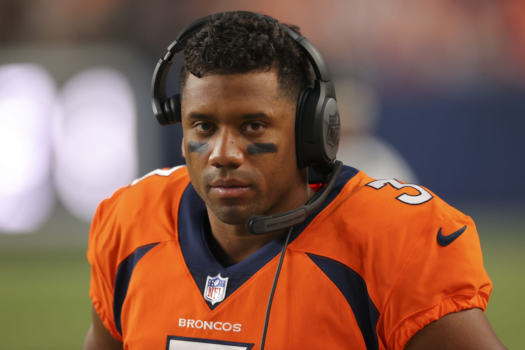 DENVER, CO - AUGUST 13: Russell Wilson #3 of the Denver Broncos looks on during the second quarter against the Dallas Cowboys at Empower Field At Mile High on August 13, 2022 in Denver, Colorado. (Photo by C. Morgan Engel/Getty Images)