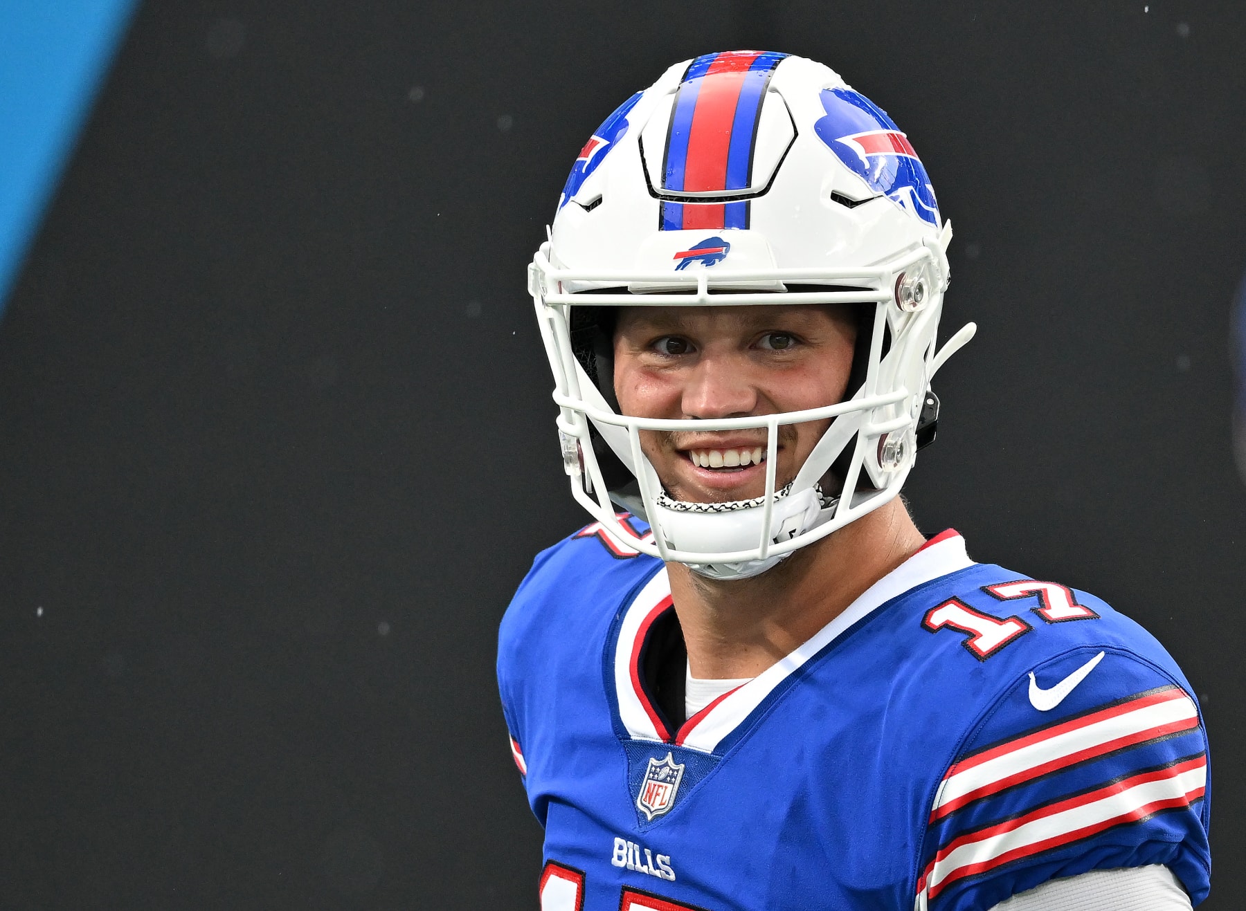 CHARLOTTE, NORTH CAROLINA - AUGUST 26:  Josh Allen #17 of the Buffalo Bills smiles during warmups before a preseason game against the Carolina Panthers at Bank of America Stadium on August 26, 2022 in Charlotte, North Carolina. (Photo by Grant Halverson/Getty Images)