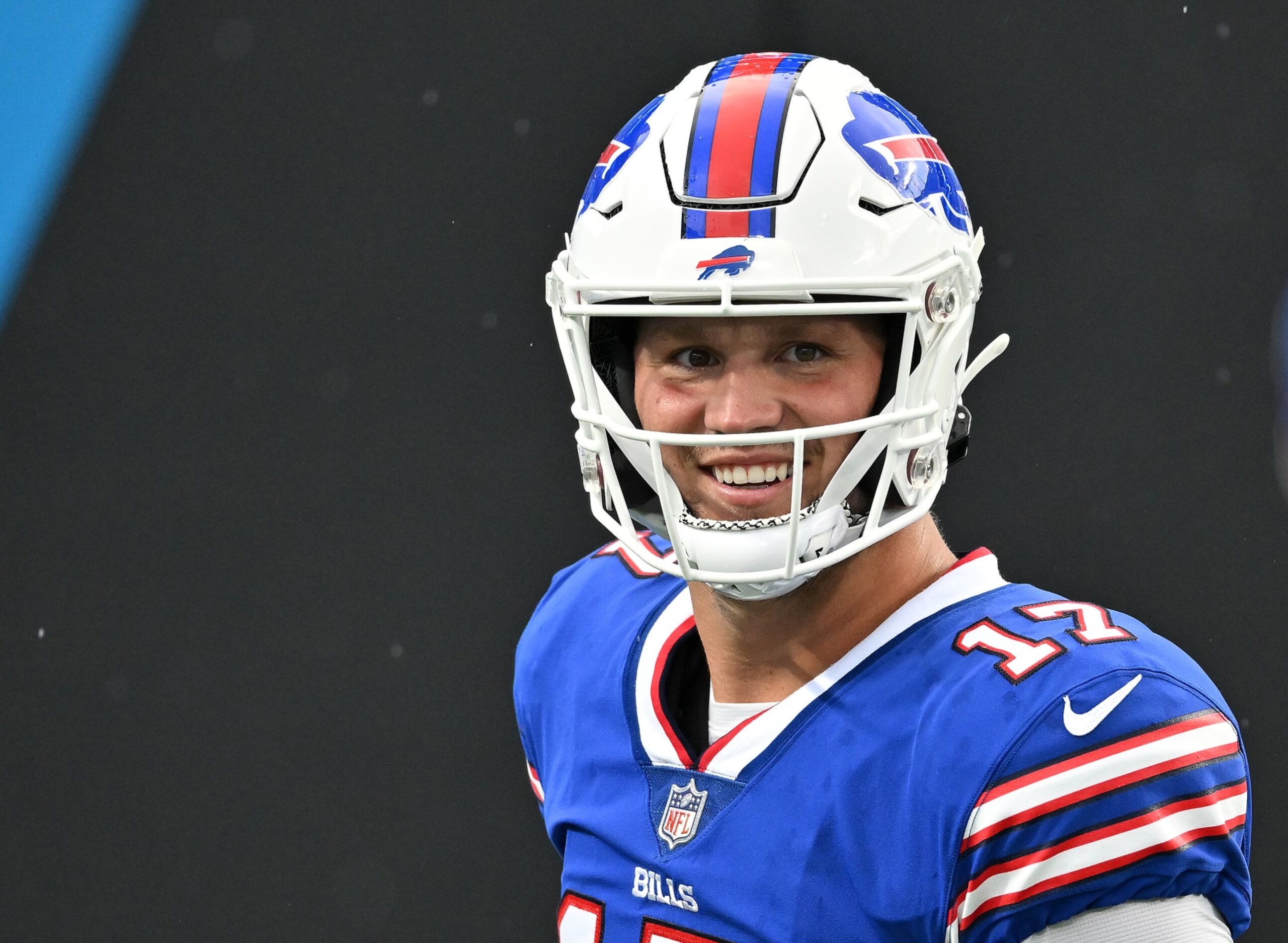 CHARLOTTE, NORTH CAROLINA - AUGUST 26: Josh Allen #17 of the Buffalo Bills smiles during warmups before a preseason game against the Carolina Panthers at Bank of America Stadium on August 26, 2022 in Charlotte, North Carolina. (Photo by Grant Halverson/Getty Images) CHARLOTTE, NORTH CAROLINA - AUGUST 26: Josh Allen #17 of the Buffalo Bills smiles during warmups before a preseason game against the Carolina Panthers at Bank of America Stadium on August 26, 2022 in Charlotte, North Carolina. (Photo by Grant Halverson/Getty Images)