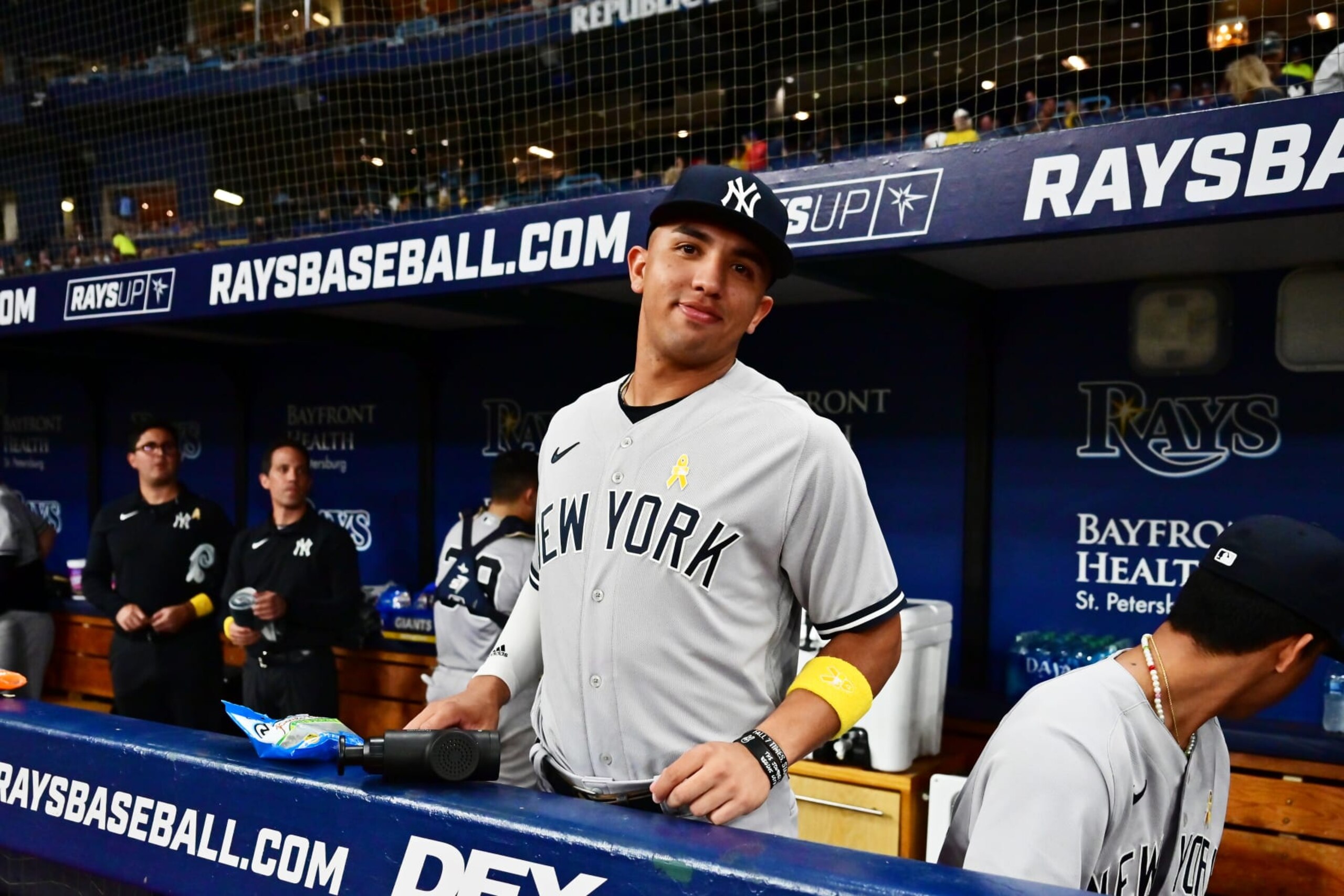 ST PETERSBURG, FLORIDA - SEPTEMBER 02: Oswald Peraza #91 of the New York Yankees looks on from the dugout during a game against the Tampa Bay Rays at Tropicana Field on September 02, 2022 in St Petersburg, Florida. (Photo by Julio Aguilar/Getty Images)