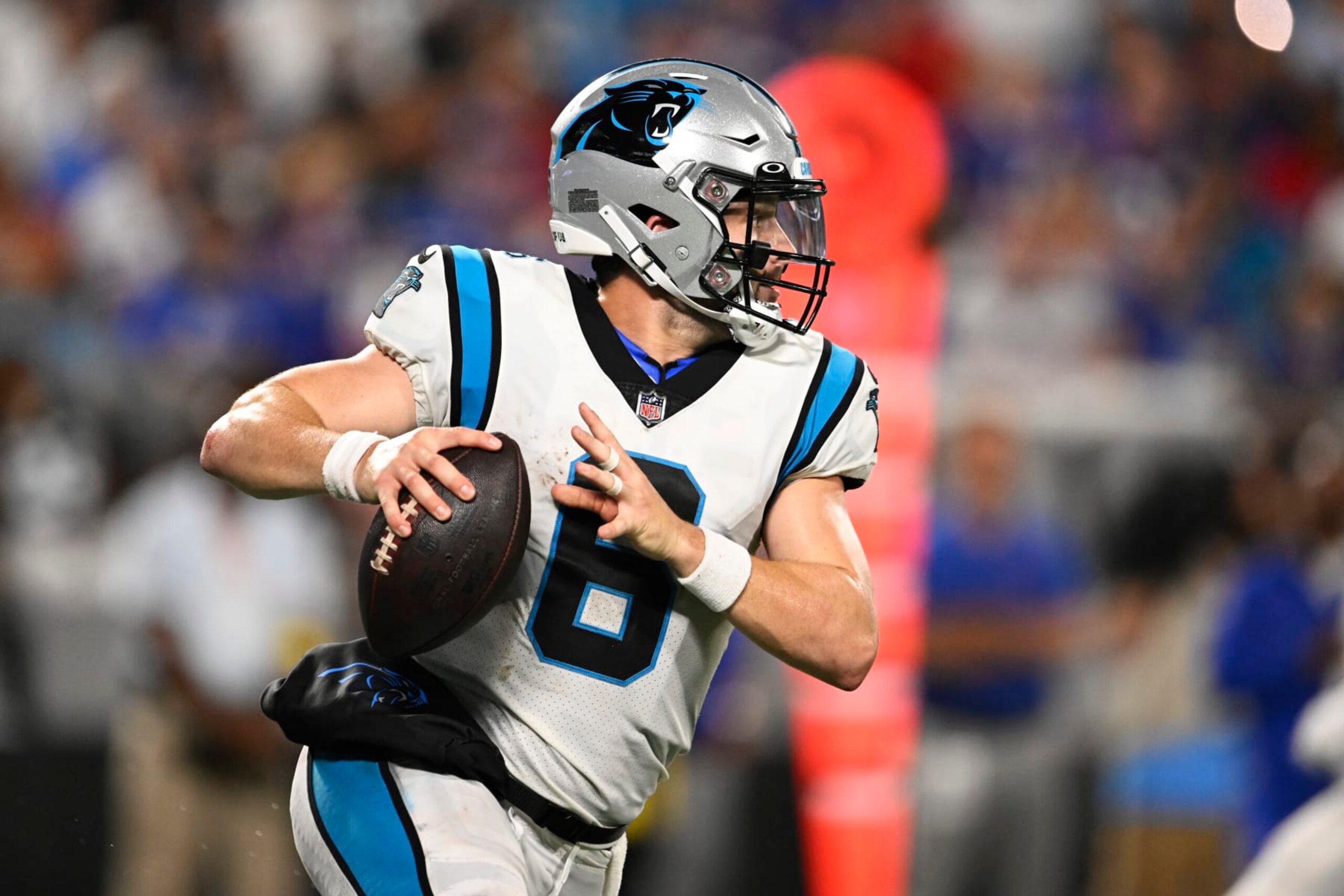 CHARLOTTE, NORTH CAROLINA - AUGUST 26: Baker Mayfield #6 of the Carolina Panthers runs with the ball in the first quarter against the Buffalo Bills during a preseason game at Bank of America Stadium on August 26, 2022 in Charlotte, North Carolina. (Photo by Eakin Howard/Getty Images)