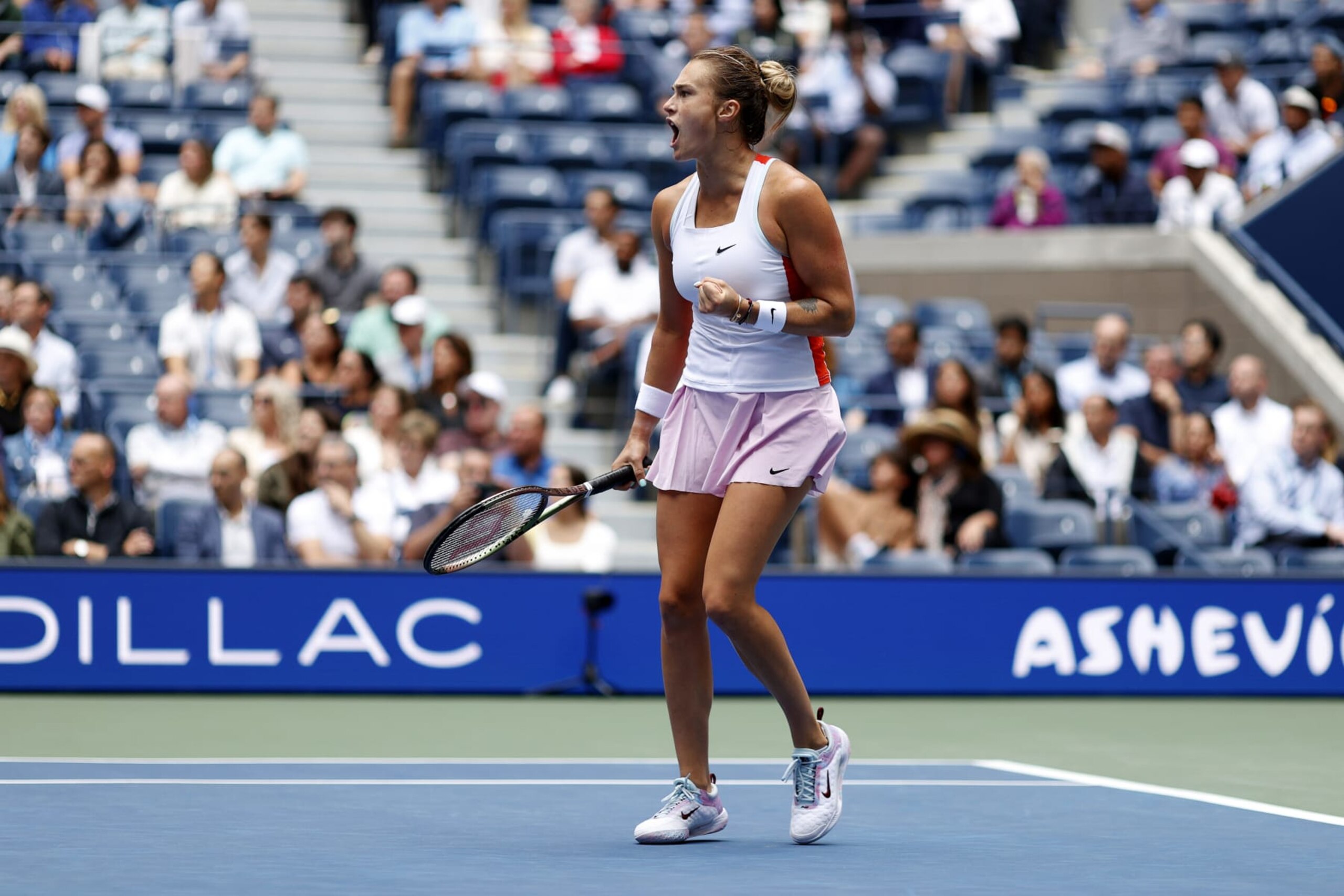 NEW YORK, NEW YORK - SEPTEMBER 07: Aryna Sabalenka celebrates a point against Karolina Pliskova of the Czech Republic during their Women’s Singles Quarterfinal match on Day Ten of the 2022 US Open at USTA Billie Jean King National Tennis Center on September 07, 2022 in the Flushing neighborhood of the Queens borough of New York City. (Photo by Sarah Stier/Getty Images)