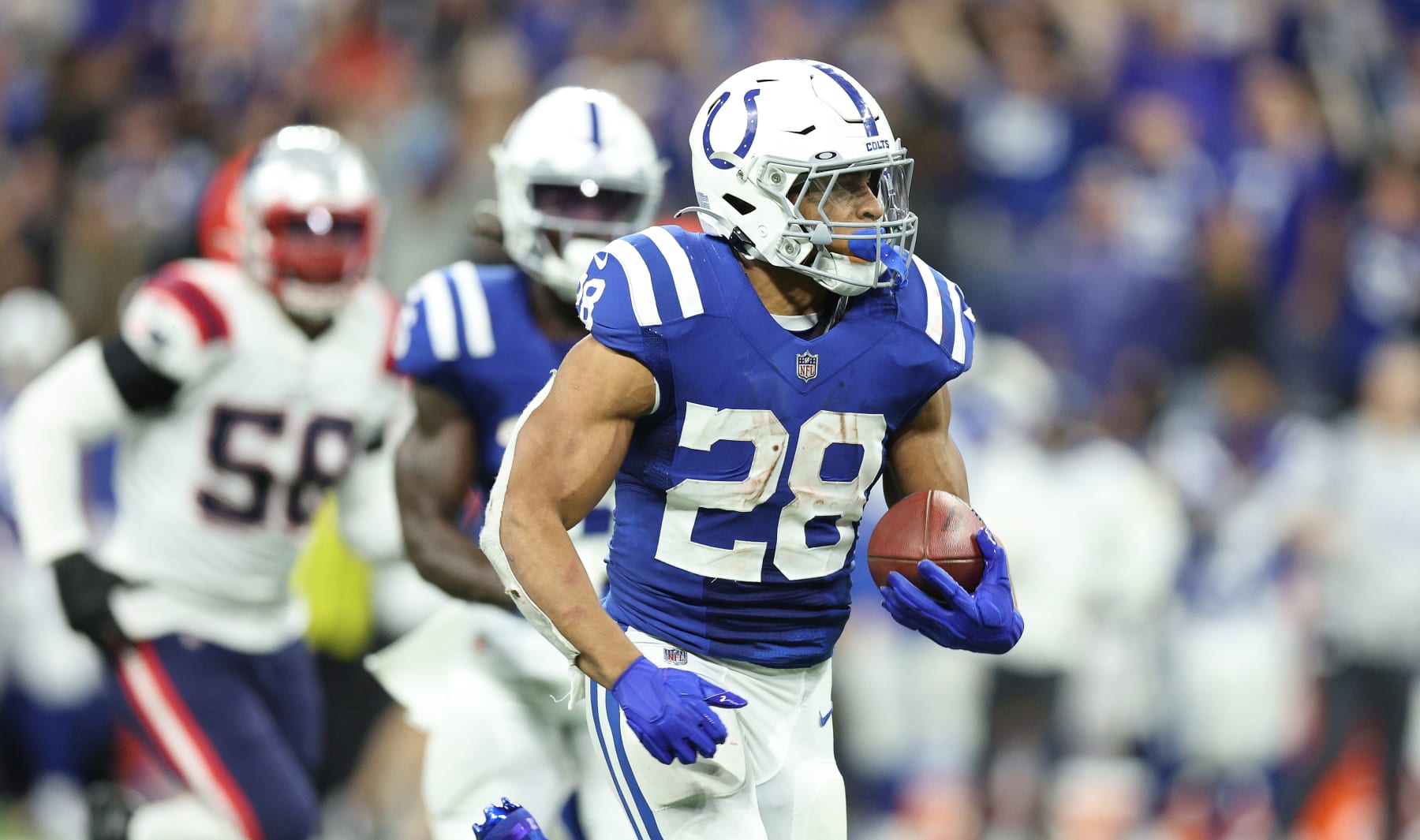 INDIANAPOLIS, INDIANA - DECEMBER 18:  Jonathan Taylor #28 of the Indianapolis Colts against the New England Patriots at Lucas Oil Stadium on December 18, 2021 in Indianapolis, Indiana. (Photo by Andy Lyons/Getty Images)