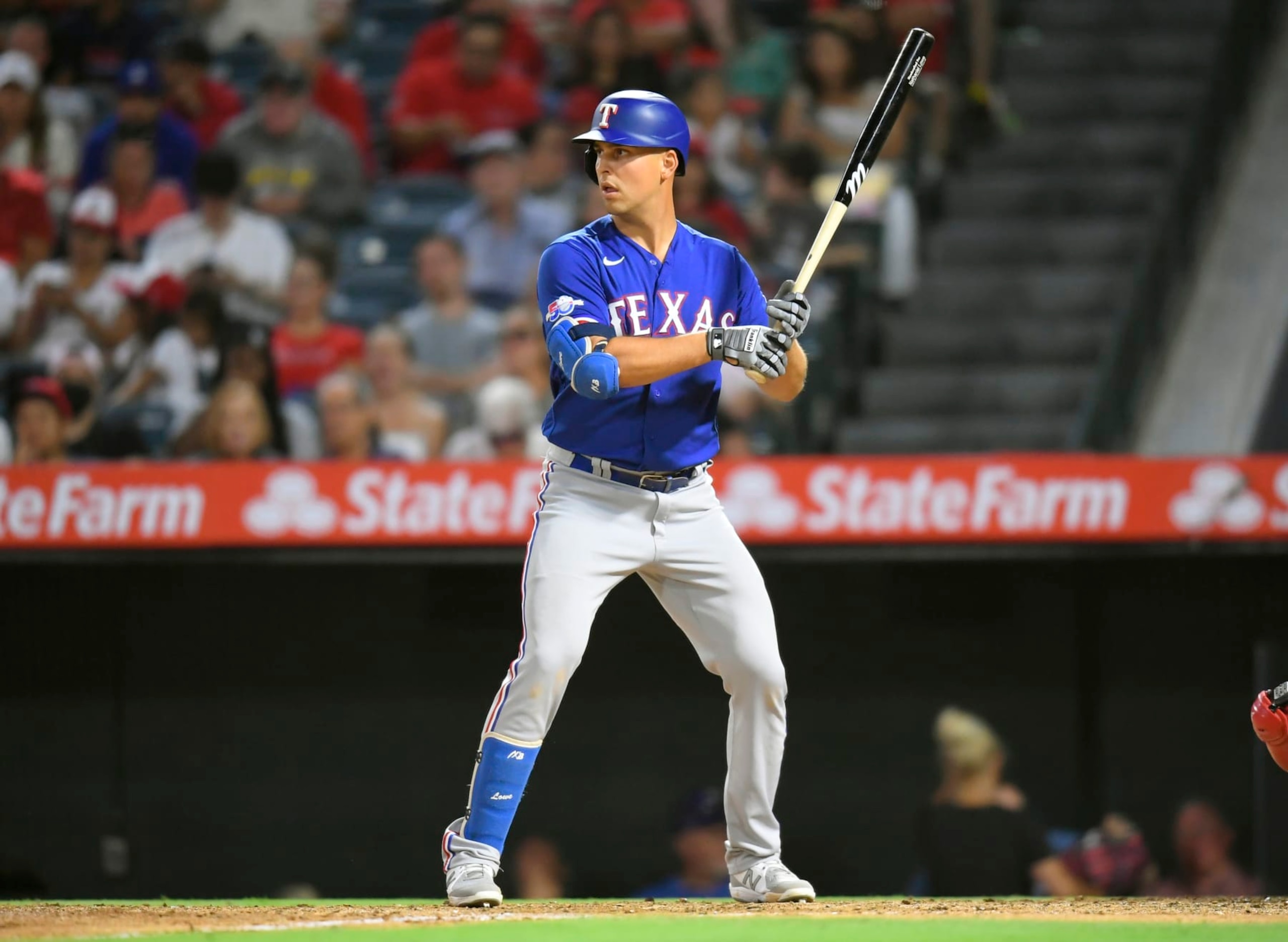 ANAHEIM, CA - JULY 30: Nathaniel Lowe #30 of the Texas Rangers at bat against the Los Angeles Angels at Angel Stadium of Anaheim on July 30, 2022 in Anaheim, California. (Photo by John McCoy/Getty Images)