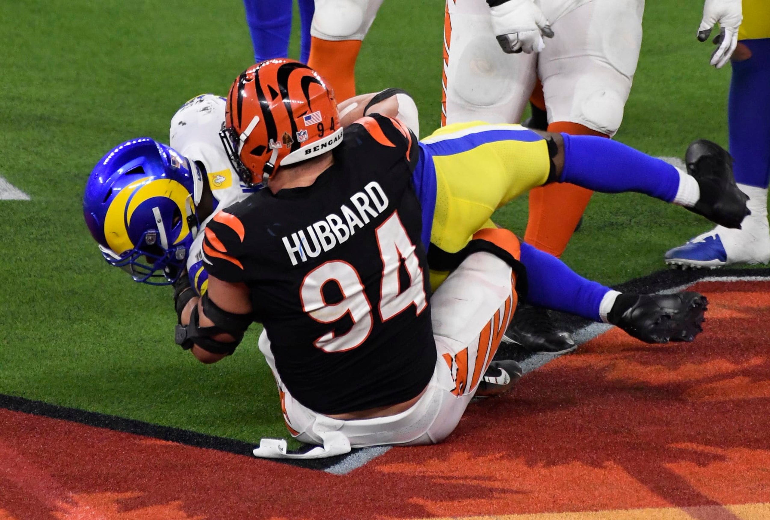 INGLEWOOD, CALIFORNIA - FEBRUARY 13: Sam Hubbard #94 of the Cincinnati Bengals tackles the runner Cam Akers #23 of the ""Los Angeles Rams during Super Bowl LVI at SoFi Stadium on February 13, 2022 in Inglewood, California. (Photo by Focus on Sport/Getty Images) INGLEWOOD, CALIFORNIA - FEBRUARY 13: Sam Hubbard #94 of the Cincinnati Bengals tackles the runner Cam Akers #23 of the ""Los Angeles Rams during Super Bowl LVI at SoFi Stadium on February 13, 2022 in Inglewood, California. (Photo by Focus on Sport/Getty Images)