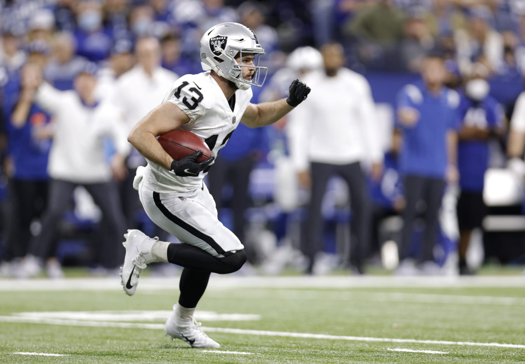 INDIANAPOLIS, INDIANA - JANUARY 02: Hunter Renfrow #13 of the Las Vegas Raiders runs with the ball during the second half against the Indianapolis Colts at Lucas Oil Stadium on January 02, 2022 in Indianapolis, Indiana. (Photo by Michael Hickey/Getty Images)