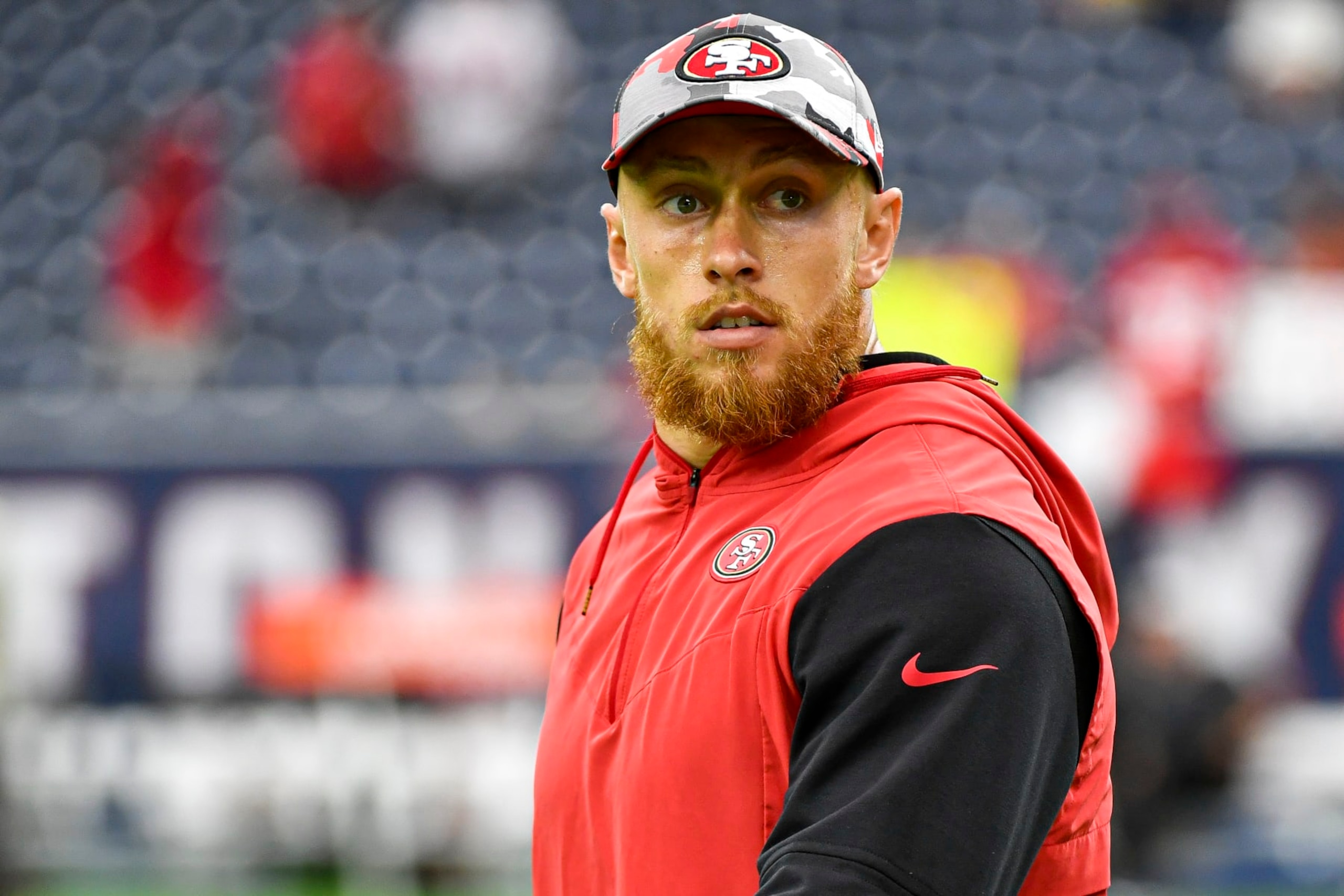 HOUSTON, TEXAS - AUGUST 25: George Kittle #85 of the San Francisco 49ers acknowledges fans prior to the preseason game at NRG Stadium against the Houston Texans on August 25, 2022 in Houston, Texas. (Photo by Logan Riely/Getty Images)