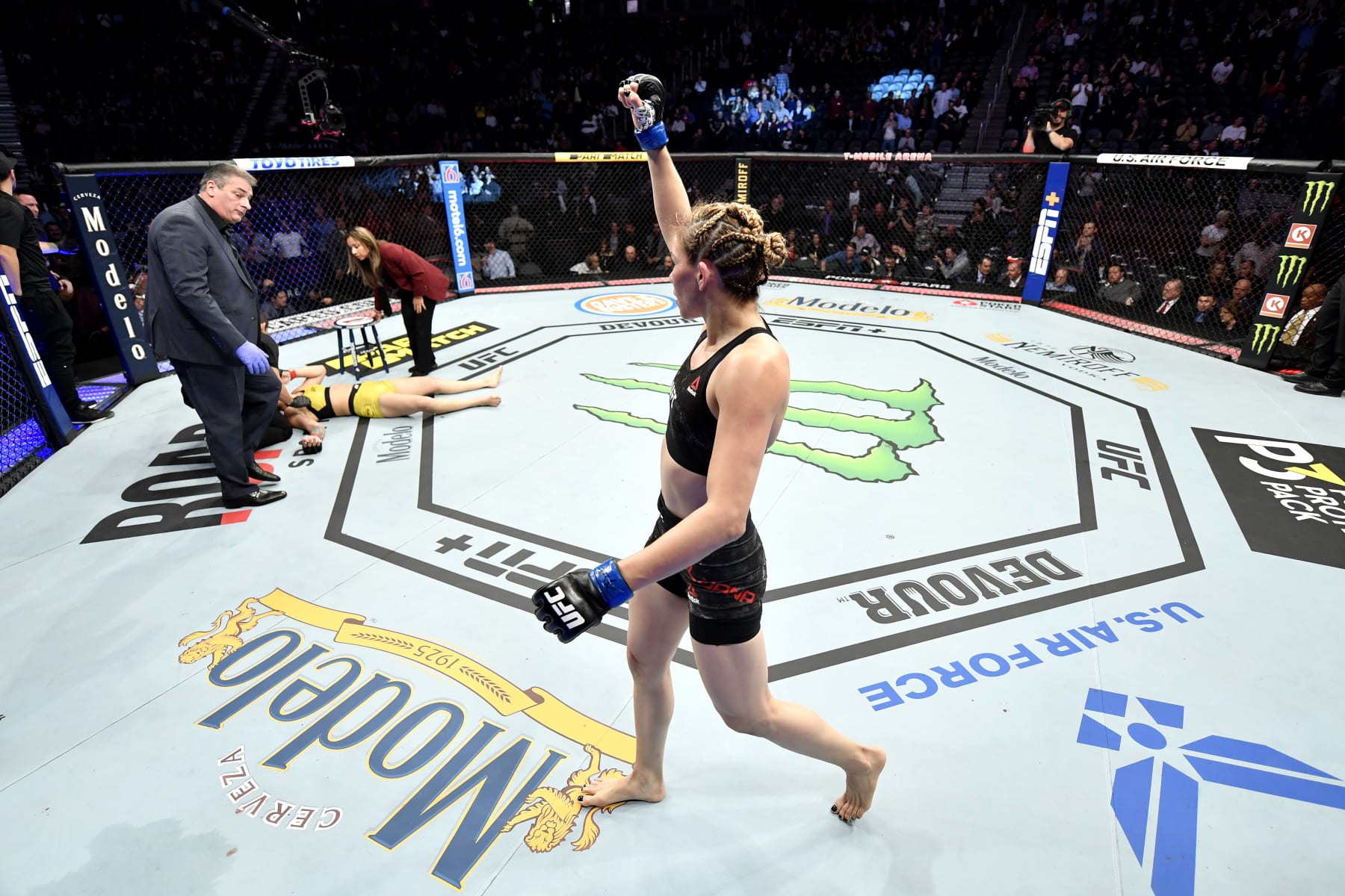 LAS VEGAS, NEVADA - DECEMBER 14:  Irene Aldana of Mexico celebrates her victory over Ketlen Vieira of Brazil in their women's bantamweight bout during the UFC 245 event at T-Mobile Arena on December 14, 2019 in Las Vegas, Nevada. (Photo by Jeff Bottari/Zuffa LLC)