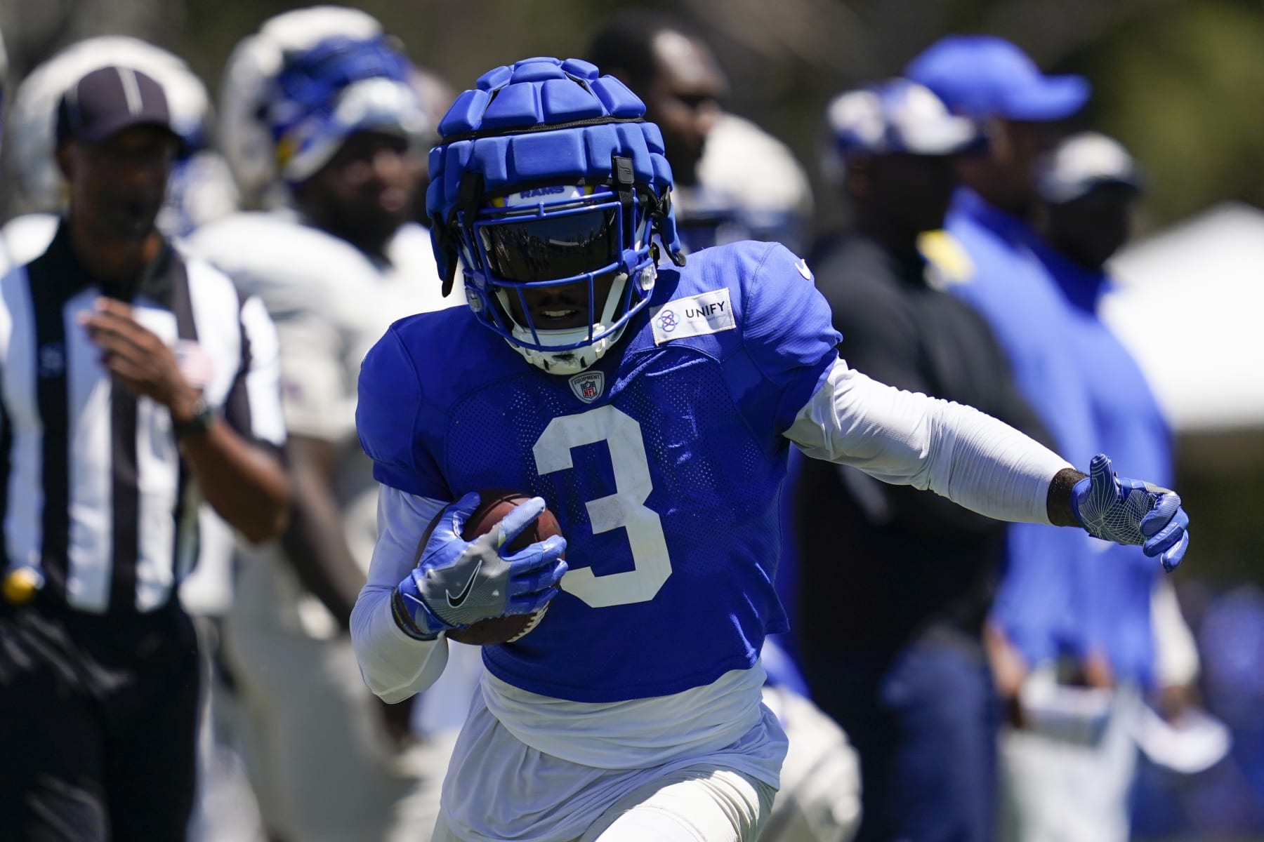Los Angeles Rams running back Cam Akers (3) participates in drills at the NFL football team's practice facility in Irvine, Calif. Saturday, Aug. 6, 2022. (AP Photo/Ashley Landis)