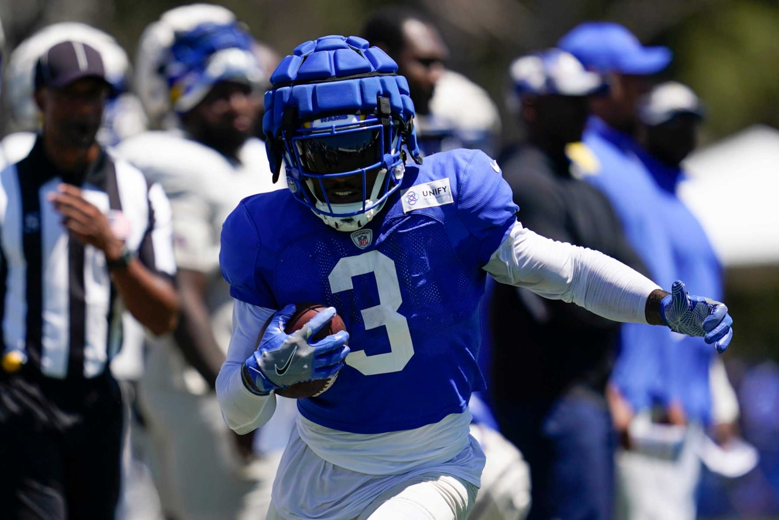 Los Angeles Rams running back Cam Akers (3) participates in drills at the NFL football team's practice facility in Irvine, Calif. Saturday, Aug. 6, 2022. (AP Photo/Ashley Landis)