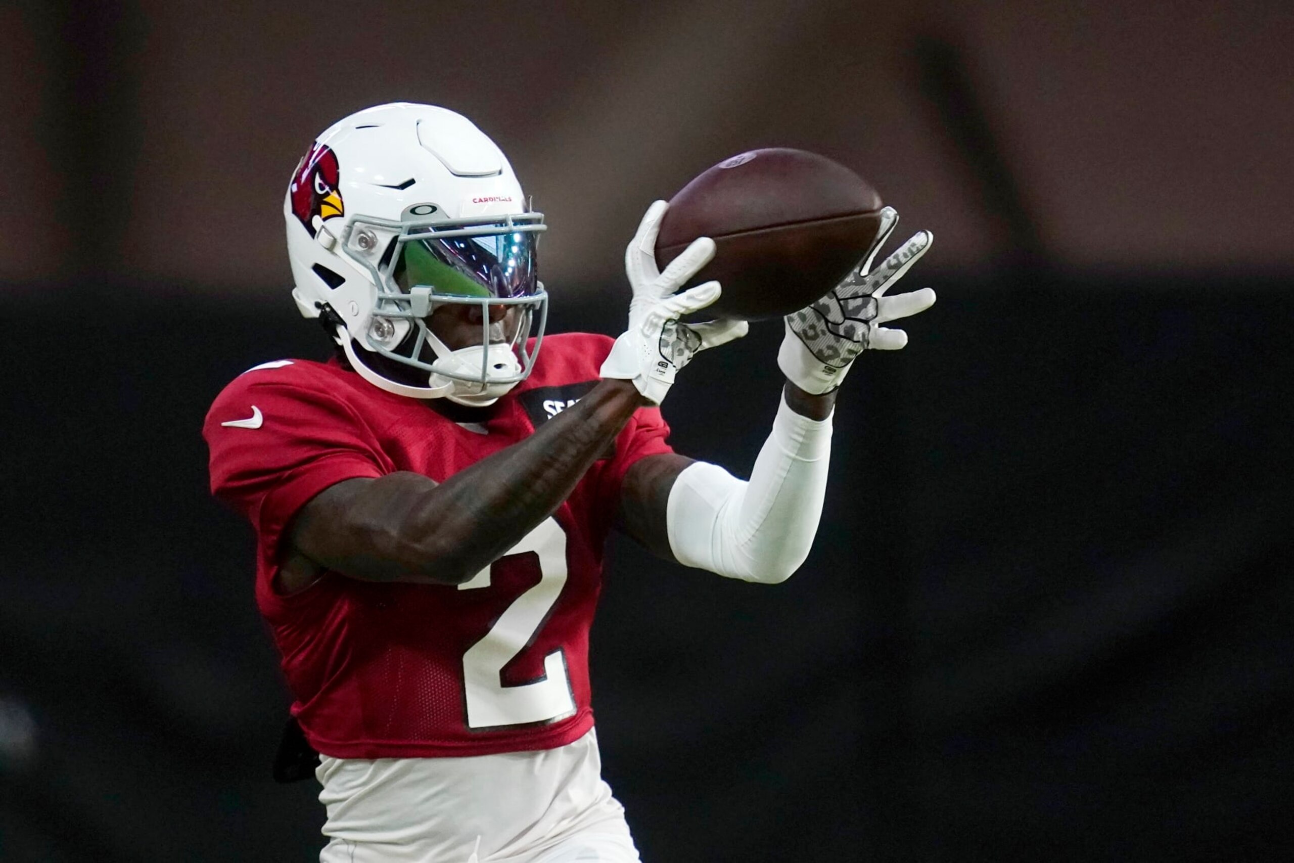 Arizona Cardinals wide receiver Marquise Brown reaches out to make a catch during the NFL football team's training camp Tuesday, Aug. 9, 2022, in Glendale, Ariz. (AP Photo/Ross D. Franklin)