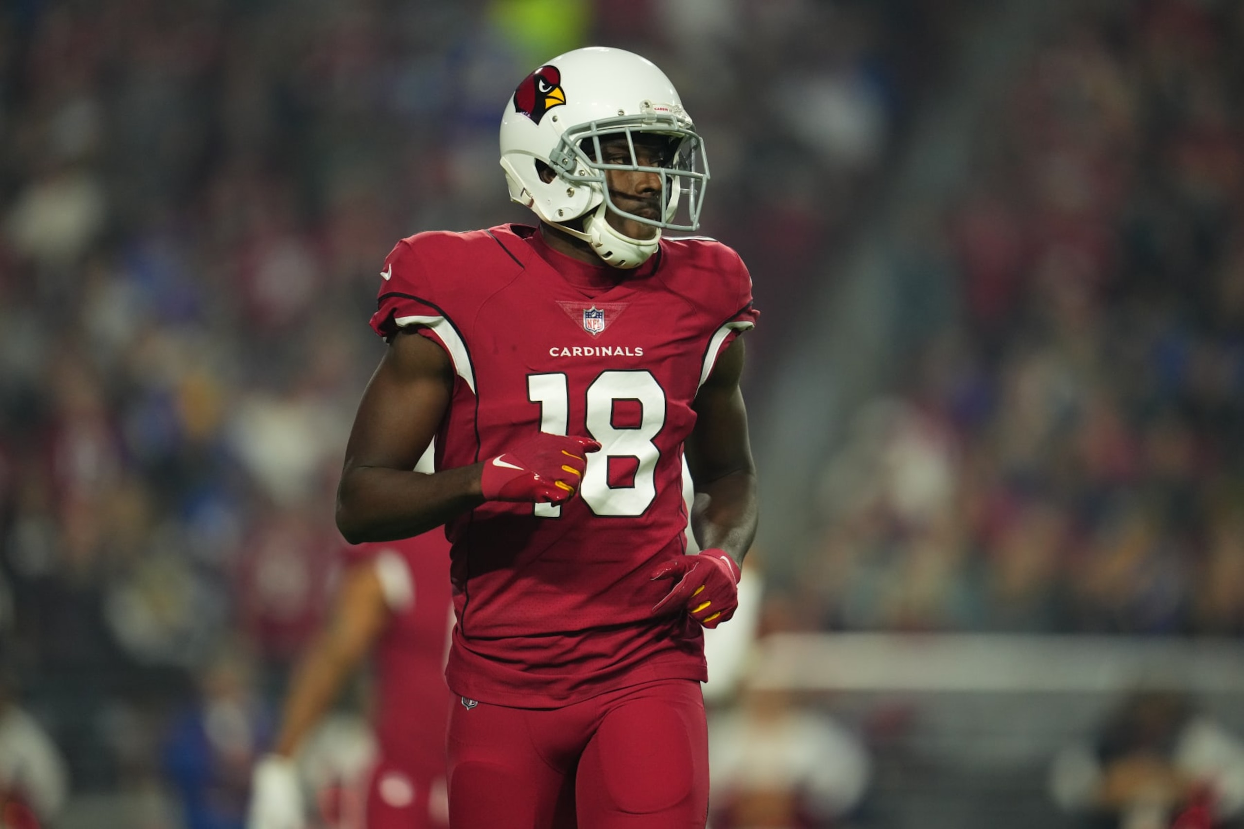 GLENDALE, ARIZONA - DECEMBER 13: A.J. Green #18 of the Arizona Cardinals gets set against the Los Angeles Rams during an NFL game at State Farm Stadium on December 13, 2021 in Glendale, Arizona. (Photo by Cooper Neill/Getty Images)