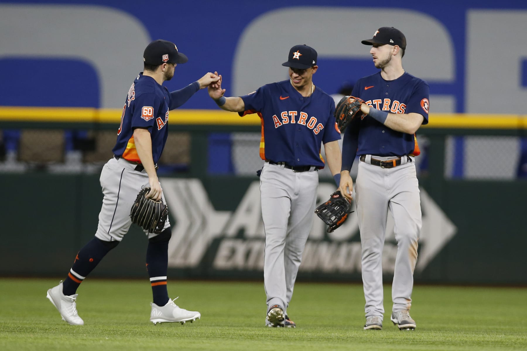ARLINGTON, TEXAS - AUGUST 30: Chas McCormick #20 of the Houston Astros, Mauricio Dubon #14 and Kyle Tucker #30 celebrate after victory over the Texas Rangers at Globe Life Field on August 30, 2022 in Arlington, Texas. (Photo by Tim Heitman/Getty Images) ARLINGTON, TEXAS - AUGUST 30: Chas McCormick #20 of the Houston Astros, Mauricio Dubon #14 and Kyle Tucker #30 celebrate after victory over the Texas Rangers at Globe Life Field on August 30, 2022 in Arlington, Texas. (Photo by Tim Heitman/Getty Images)