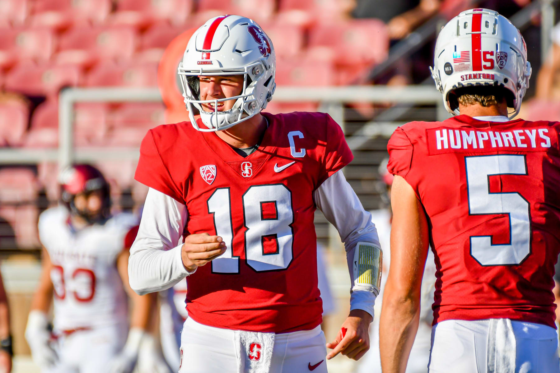 PALO ALTO, CA - SEPTEMBER 03: Stanford Cardinal quarterback Tanner McKee (18) looks to the sidelines for a play call during the game between the Colgate Raiders and the Stanford Cardinal on Saturday, September 3, 2022 at Stanford Stadium in Palo Alto, California. (Photo by Douglas Stringer/Icon Sportswire via Getty Images)
