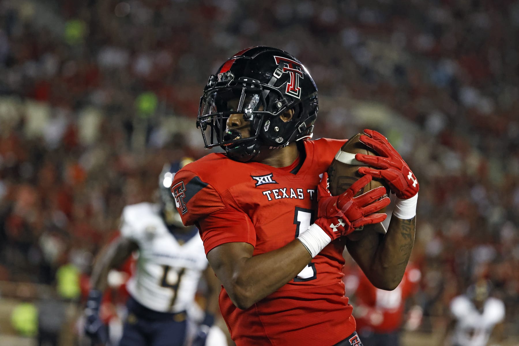 Texas Tech's Myles Price (1) catches the ball during the second half of the team's NCAA college football game against Murray State, Saturday, Sept. 3, 2022, in Lubbock, Texas. (AP Photo/Brad Tollefson)
