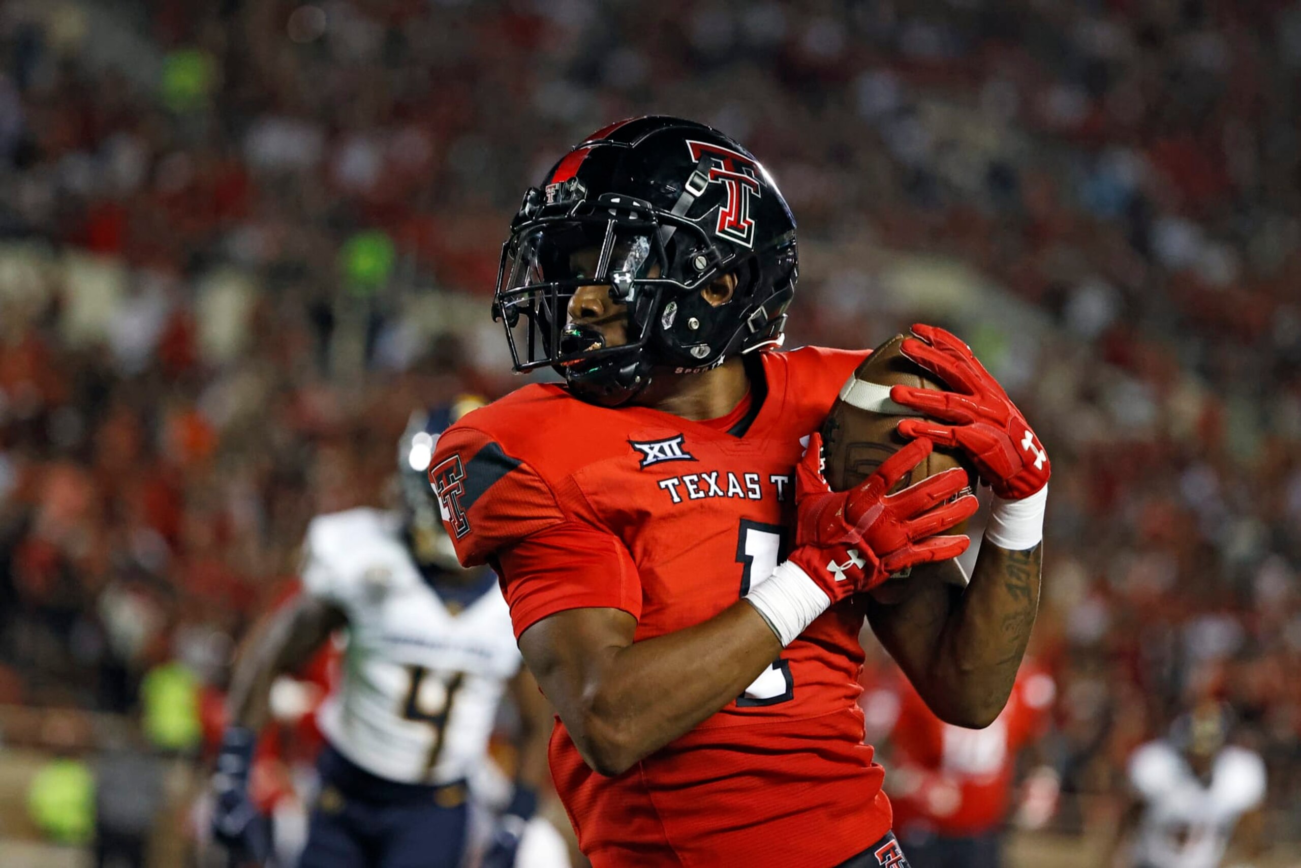 Texas Tech's Myles Price (1) catches the ball during the second half of the team's NCAA college football game against Murray State, Saturday, Sept. 3, 2022, in Lubbock, Texas. (AP Photo/Brad Tollefson)