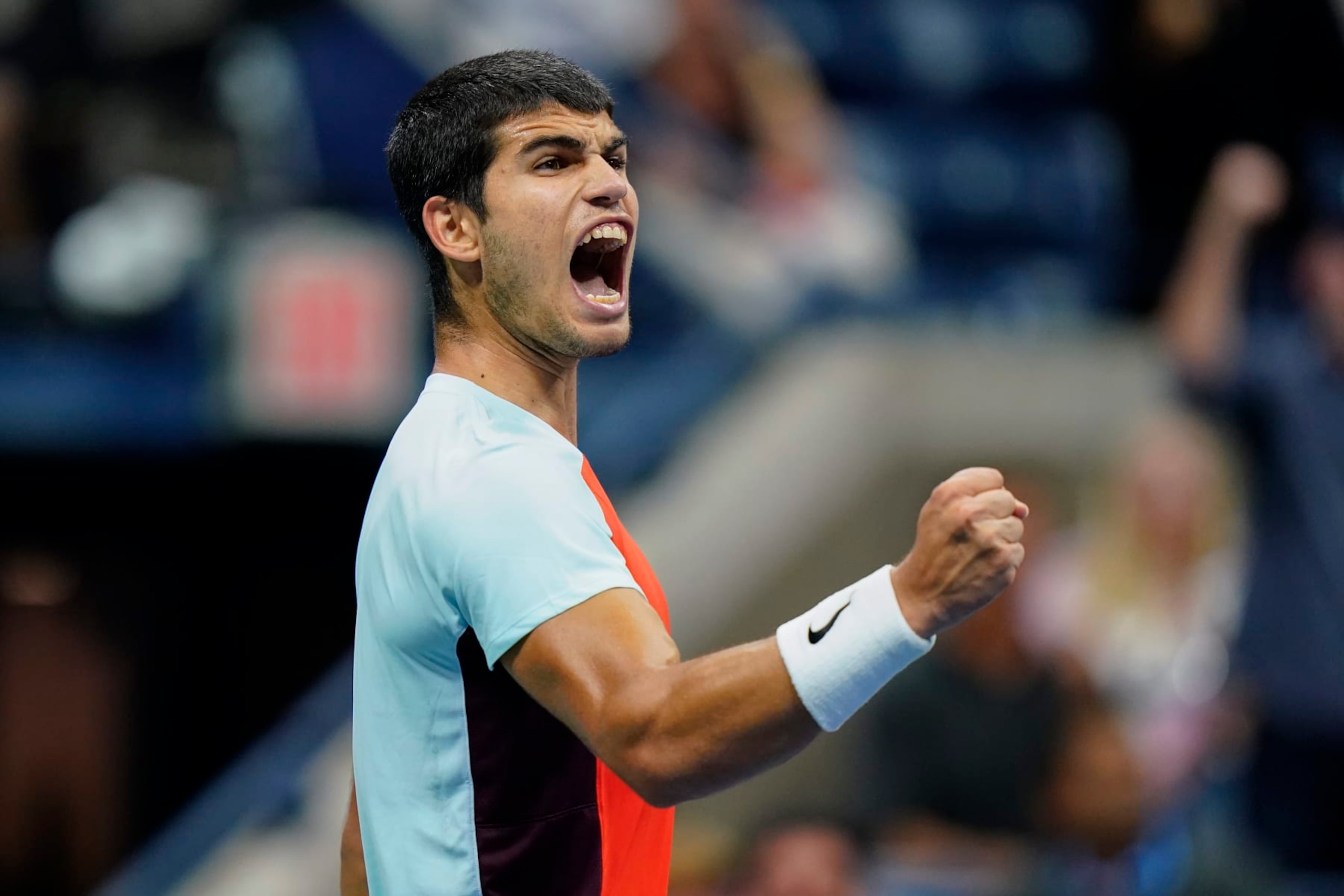 Carlos Alcaraz, of Spain, lets out a yell as he plays against Jannik Sinner, of Italy, during the quarterfinals of the U.S. Open tennis championships, Thursday, Sept. 8, 2022, in New York. (AP Photo/Frank Franklin II)