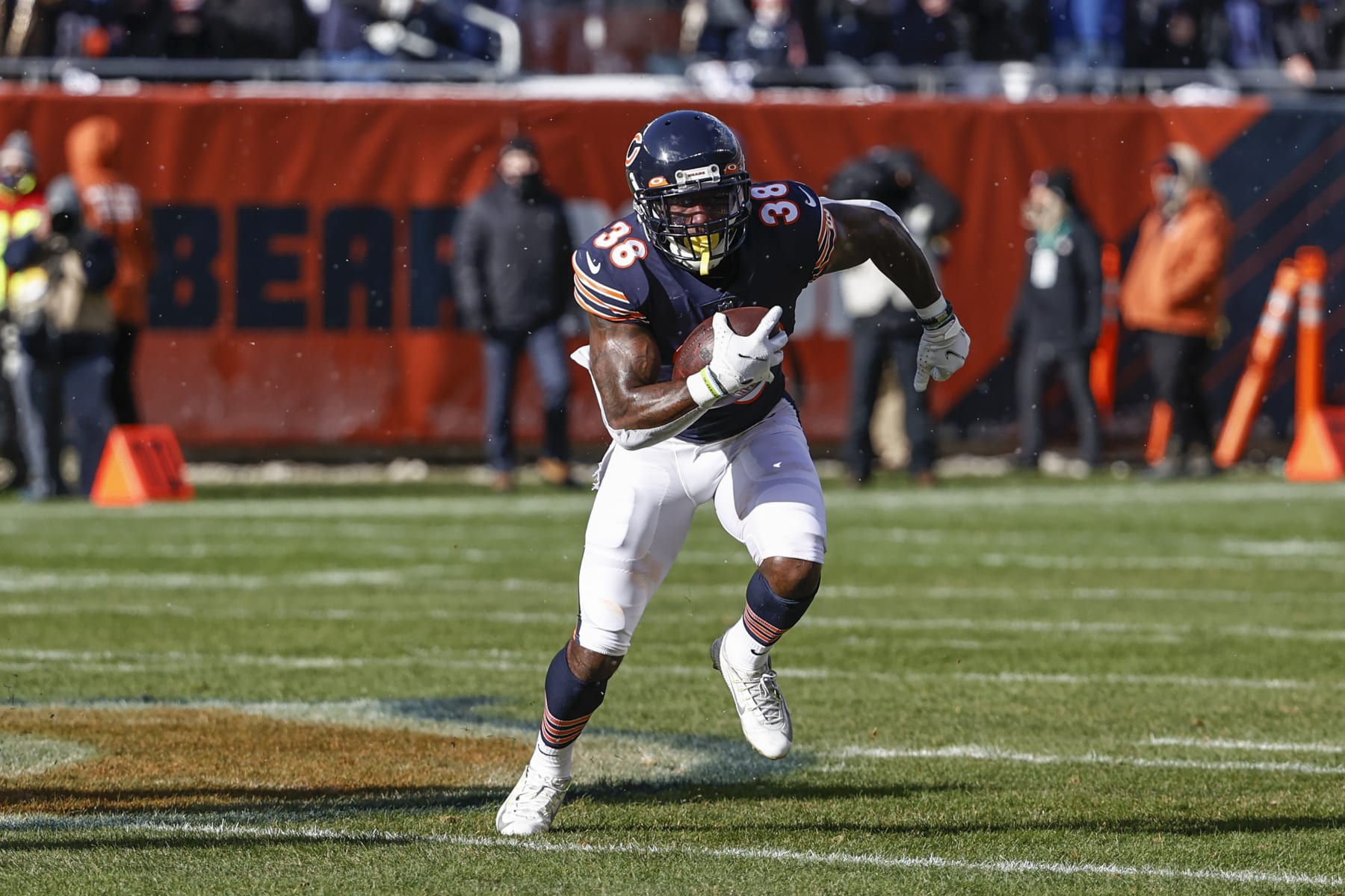 Chicago Bears safety Tashaun Gipson (38) runs with the ball during the first half of an NFL football game against the New York Giants, Sunday, Jan. 2, 2022, in Chicago. (AP Photo/Kamil Krzaczynski)