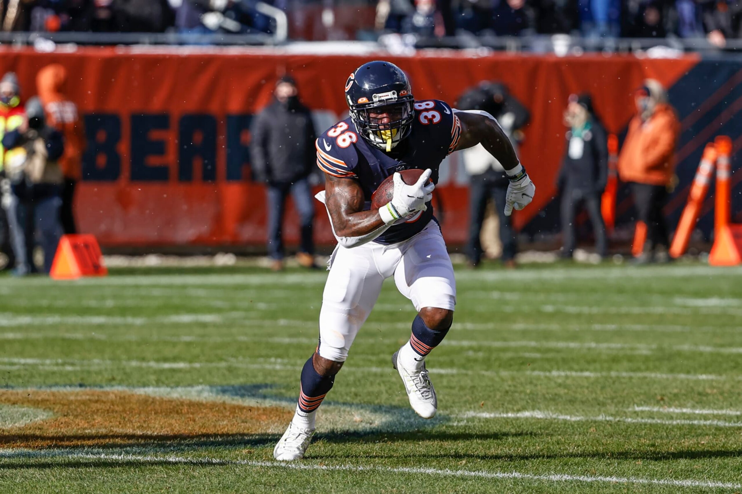 Chicago Bears safety Tashaun Gipson (38) runs with the ball during the first half of an NFL football game against the New York Giants, Sunday, Jan. 2, 2022, in Chicago. (AP Photo/Kamil Krzaczynski)
