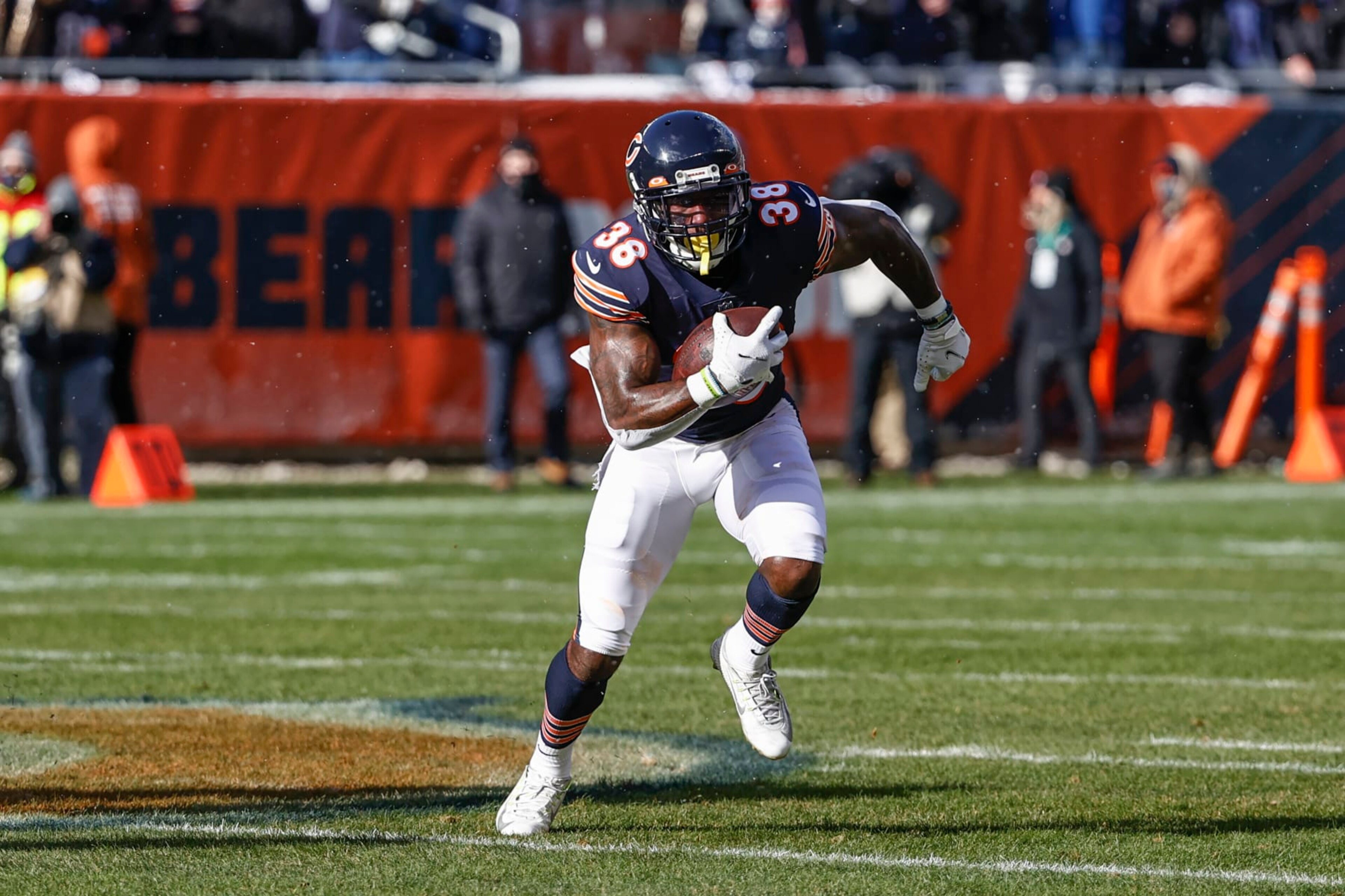 Chicago Bears safety Tashaun Gipson (38) runs with the ball during the first half of an NFL football game against the New York Giants, Sunday, Jan. 2, 2022, in Chicago. (AP Photo/Kamil Krzaczynski)