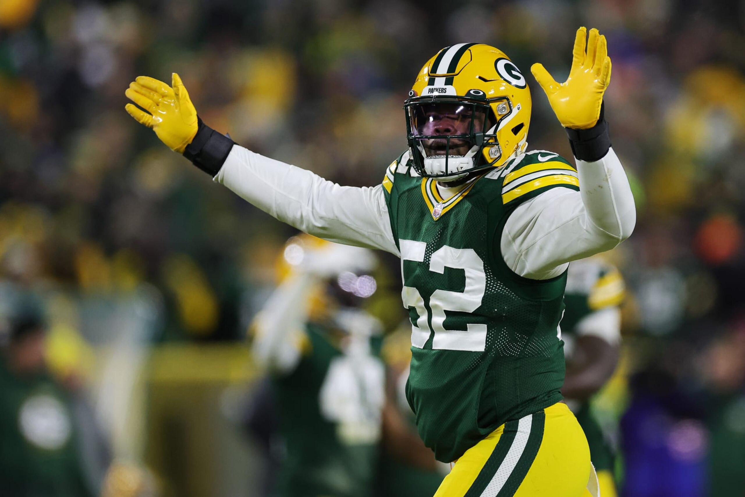 GREEN BAY, WISCONSIN - JANUARY 22:  Rashan Gary #52 of the Green Bay Packers reacts after making a sack during the first quarter of the NFC Divisional Playoff game against the San Francisco 49ers at Lambeau Field on January 22, 2022 in Green Bay, Wisconsin. (Photo by Stacy Revere/Getty Images)