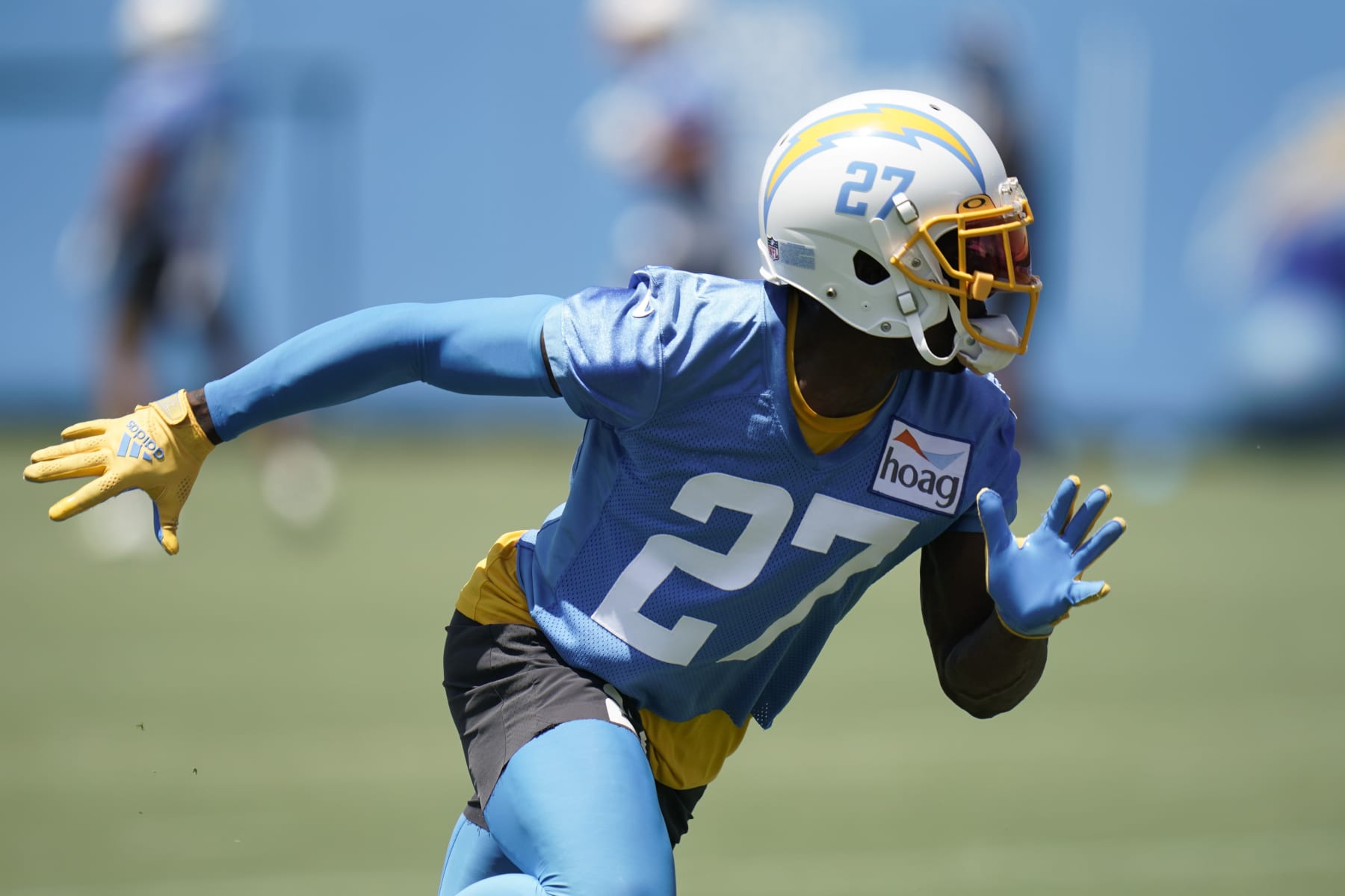 Los Angeles Chargers' J.C. Jackson runs a play during practice at the NFL football team's practice facility Wednesday, June 15, 2022, in Costa Mesa, Calif. (AP Photo/Jae C. Hong)