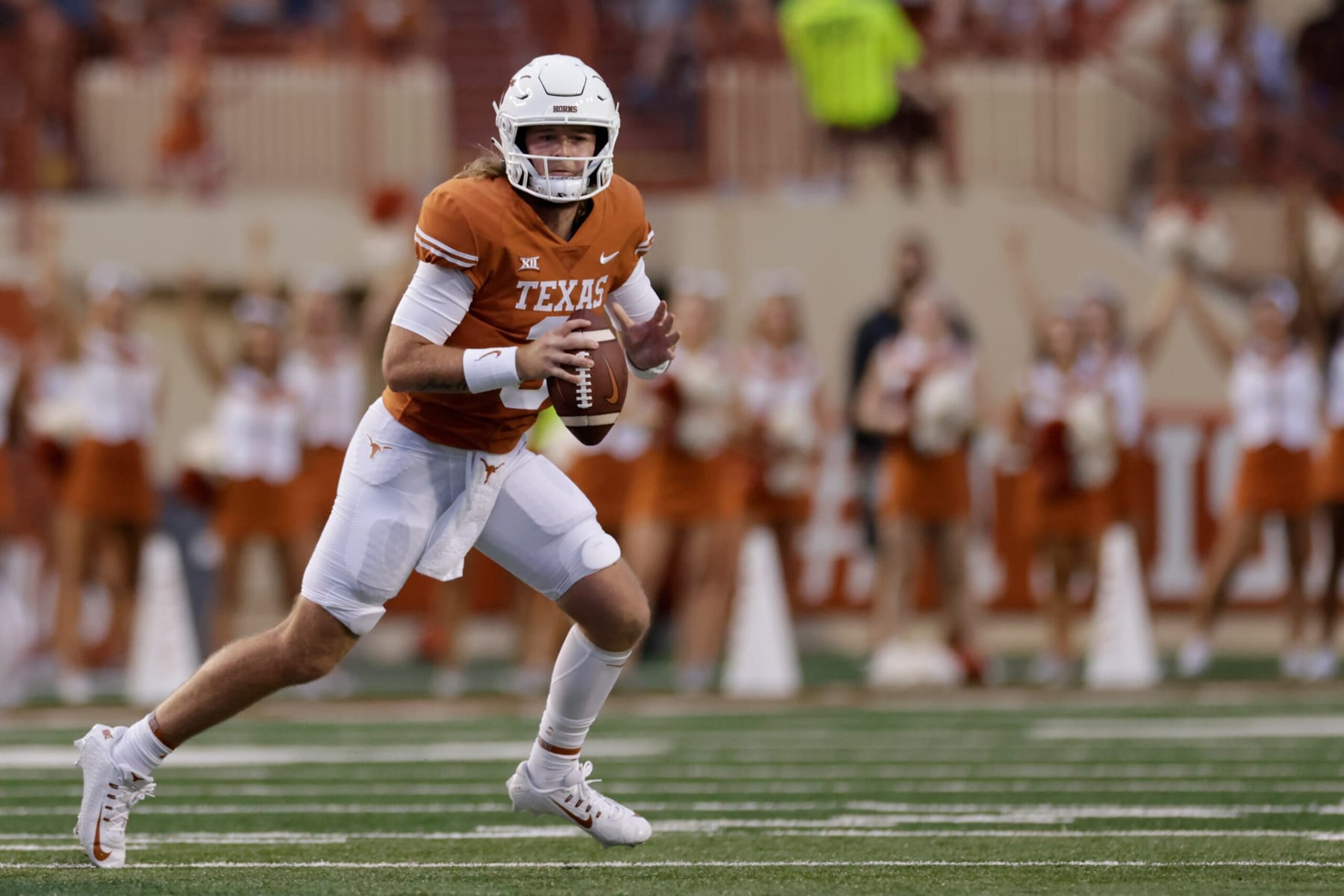 AUSTIN, TEXAS - SEPTEMBER 03: Quinn Ewers #3 of the Texas Longhorns rolls out to pass in the first half against the Louisiana Monroe Warhawks at Darrell K Royal-Texas Memorial Stadium on September 03, 2022 in Austin, Texas. (Photo by Tim Warner/Getty Images) AUSTIN, TEXAS - SEPTEMBER 03: Quinn Ewers #3 of the Texas Longhorns rolls out to pass in the first half against the Louisiana Monroe Warhawks at Darrell K Royal-Texas Memorial Stadium on September 03, 2022 in Austin, Texas. (Photo by Tim Warner/Getty Images)