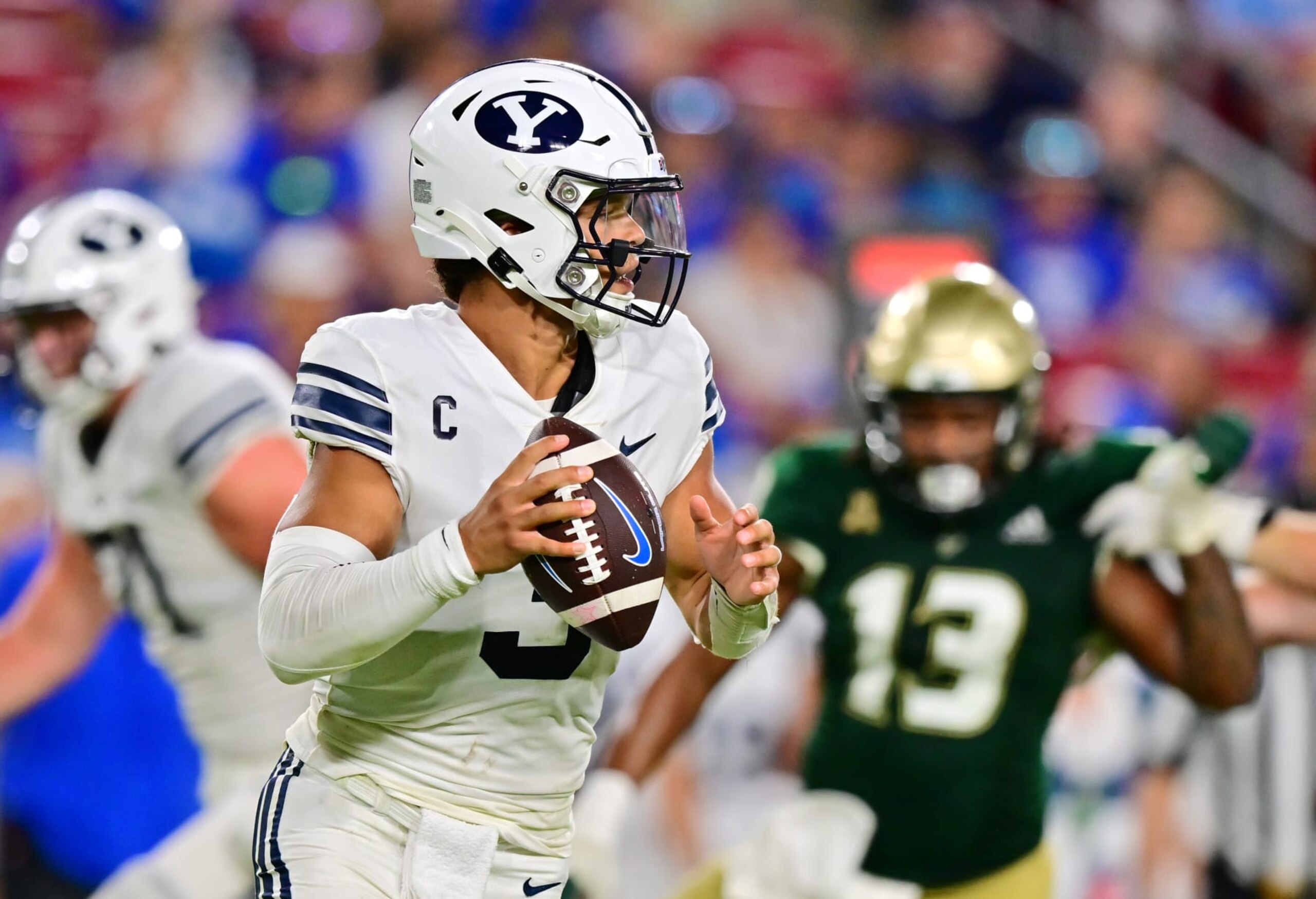 TAMPA, FLORIDA - SEPTEMBER 03: Jaren Hall #3 of the Brigham Young Cougars looks to pass in the fourth quarter against the South Florida Bulls at Raymond James Stadium on September 03, 2022 in Tampa, Florida. (Photo by Julio Aguilar/Getty Images) TAMPA, FLORIDA - SEPTEMBER 03: Jaren Hall #3 of the Brigham Young Cougars looks to pass in the fourth quarter against the South Florida Bulls at Raymond James Stadium on September 03, 2022 in Tampa, Florida. (Photo by Julio Aguilar/Getty Images)