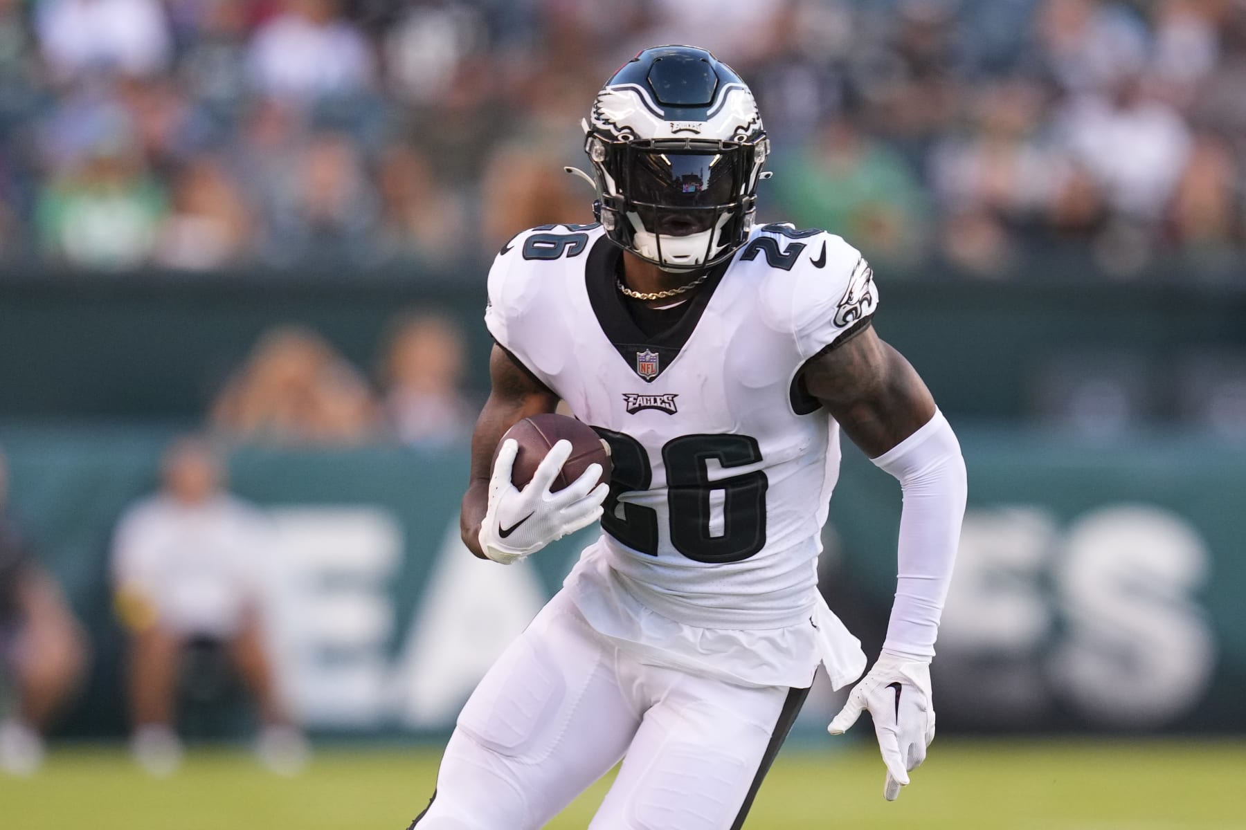 PHILADELPHIA, PA - AUGUST 12: Miles Sanders #26 of the Philadelphia Eagles runs with the ball against the New York Jets during the preseason game at Lincoln Financial Field on August 12, 2022 in Philadelphia, Pennsylvania. The Jets defeated the Eagles 24-21. (Photo by Mitchell Leff/Getty Images)