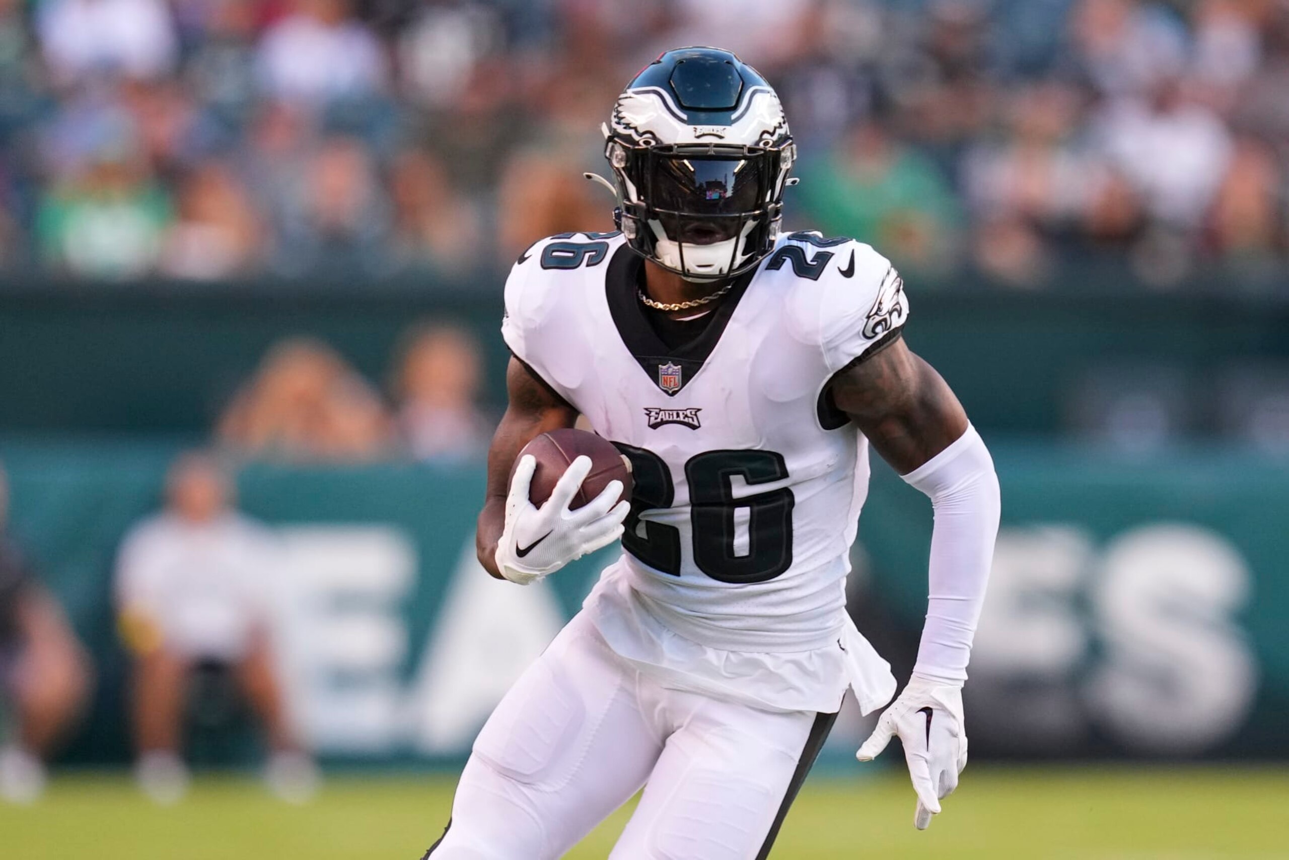 PHILADELPHIA, PA - AUGUST 12: Miles Sanders #26 of the Philadelphia Eagles runs with the ball against the New York Jets during the preseason game at Lincoln Financial Field on August 12, 2022 in Philadelphia, Pennsylvania. The Jets defeated the Eagles 24-21. (Photo by Mitchell Leff/Getty Images)
