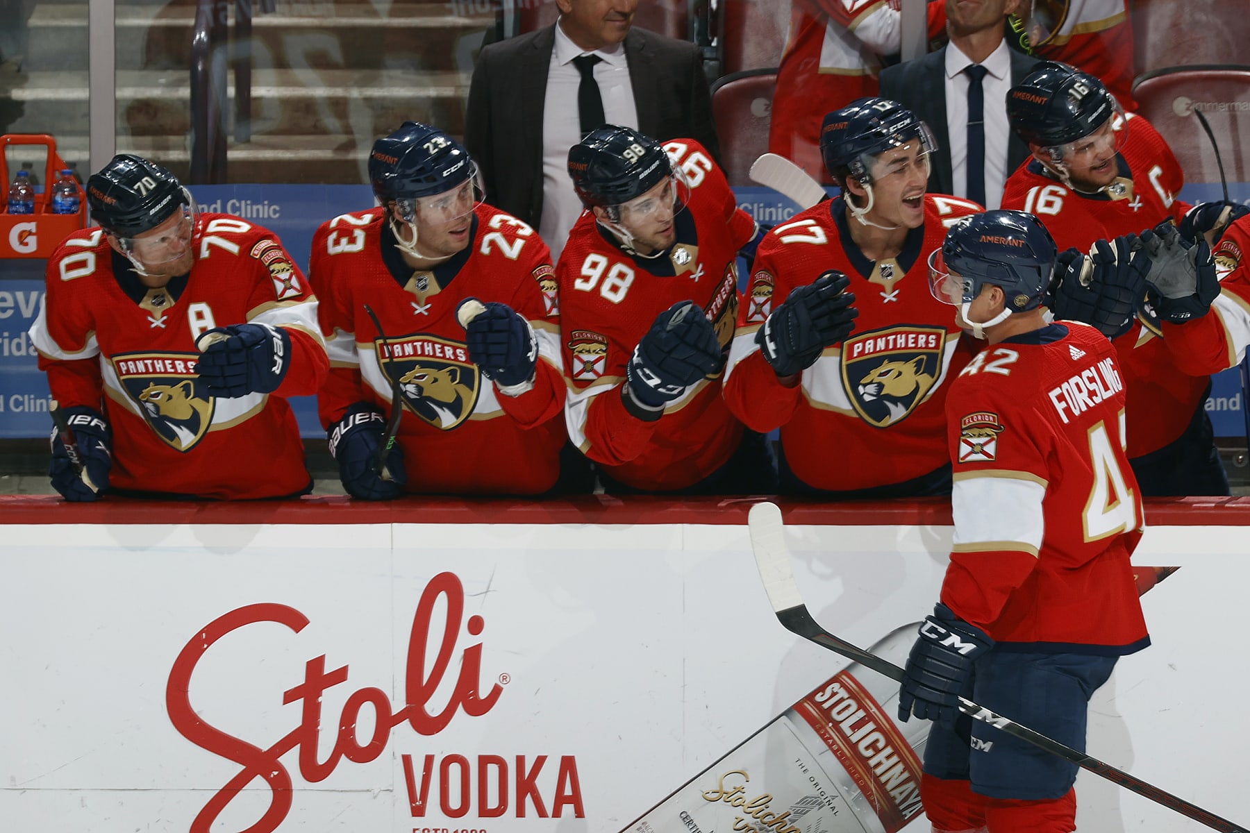 SUNRISE, FL - APRIL 15: Gustav Forsling #42 of the Florida Panthers skates by the bench and is congratulated by teammates after he scored a second period goal against the Winnipeg Jets at the FLA Live Arena on April 15, 2022 in Sunrise, Florida. (Photo by Joel Auerbach/Getty Images)