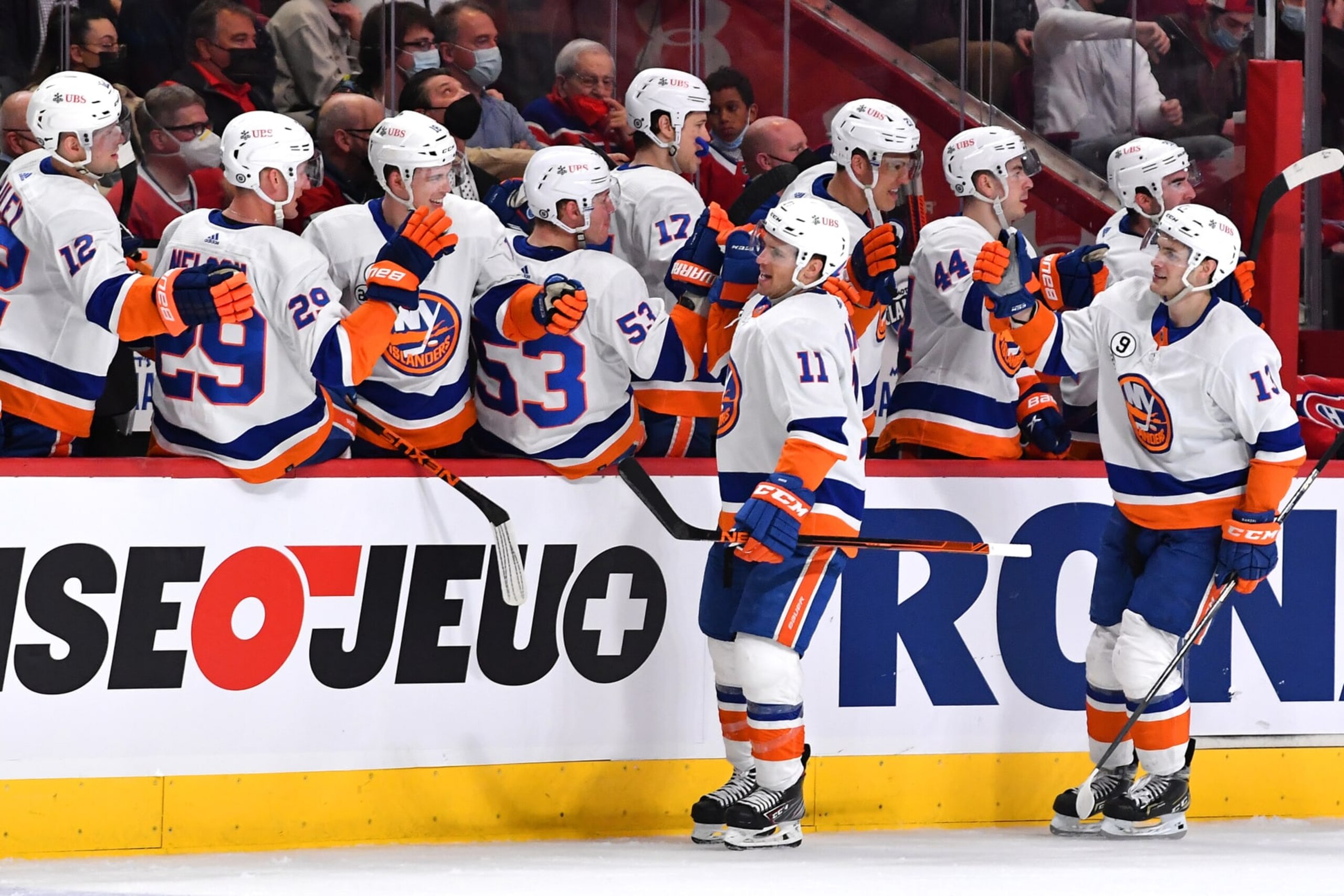 MONTREAL, QC - APRIL 15: Zach Parise #11 of the New York Islanders celebrates with the bench after scoring a goal against the Montreal Canadiens  in the NHL game at the Bell Centre on April 15, 2022 in Montreal, Quebec, Canada. (Photo by Francois Lacasse/NHLI via Getty Images)