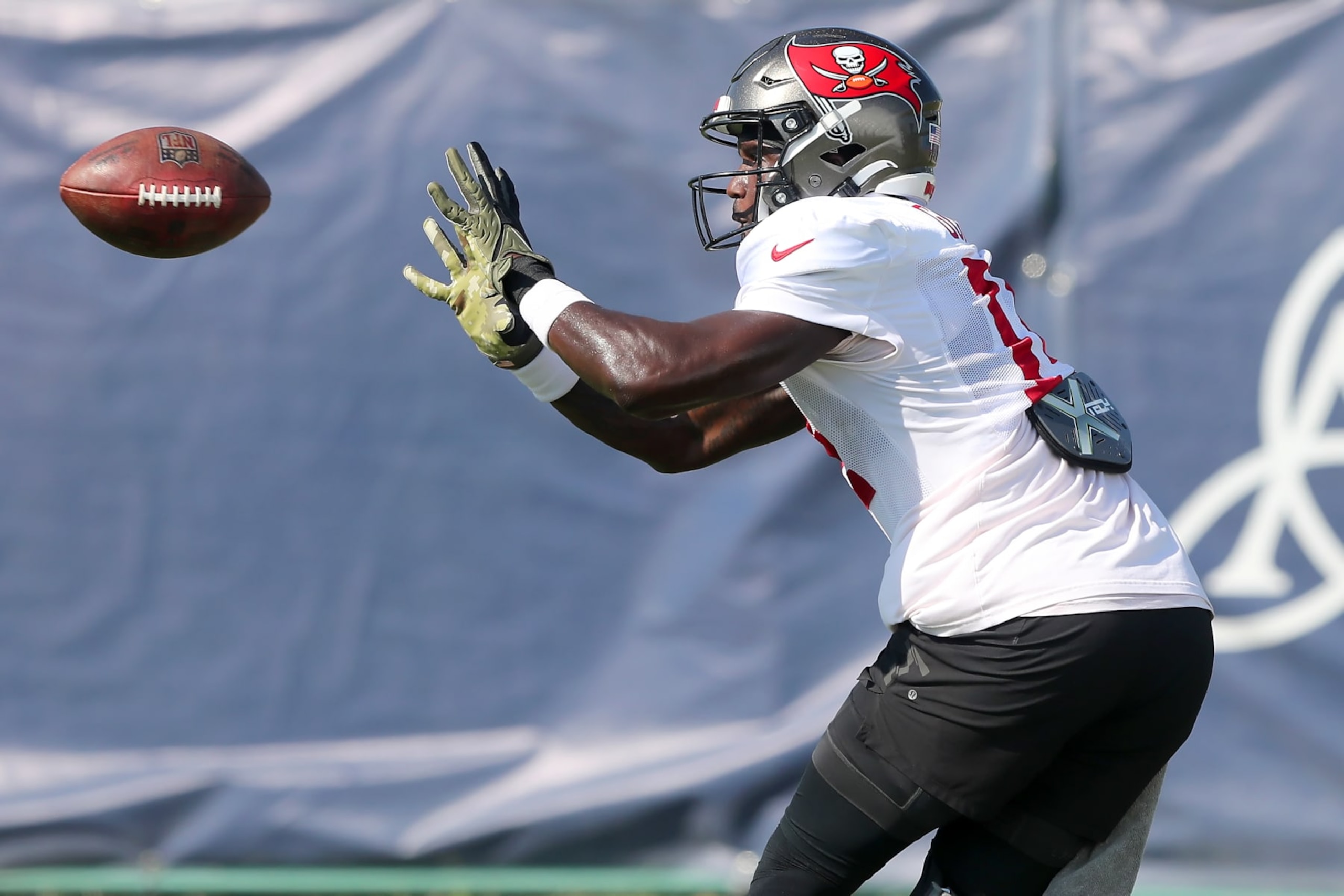 NASHVILLE, TN - AUGUST 18: Tampa Bay Buccaneers wide receiver Chris Godwin (14) catches a pass during the Tampa Bay Buccaneers-Tennessee Titans Joint-Practice on August 18, 2022 at Saint Thomas Sports Park in Nashville, TN. (Photo by Cliff Welch/Icon Sportswire via Getty Images)