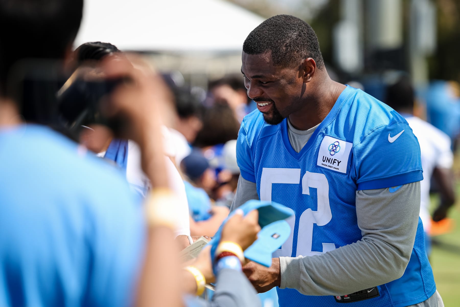 COSTA MESA, CA - JULY 27: Khalil Mack #52 of the Los Angeles Chargers interacts with fans during training camp at Jack Hammett Sports Complex on July 27, 2022 in Costa Mesa, California. (Photo by Scott Taetsch/Getty Images)