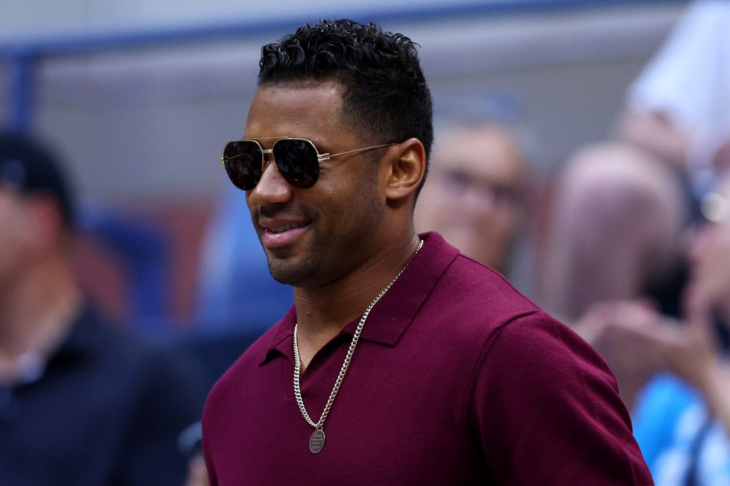NEW YORK, NEW YORK - SEPTEMBER 02: Russell Wilson of the Denver Broncos looks on prior to the Women's Singles Third Round match between Serena Williams of the United States and Ajla Tomljanovic of Australia on Day Five of the 2022 US Open at USTA Billie Jean King National Tennis Center on September 02, 2022 in the Flushing neighborhood of the Queens borough of New York City. (Photo by Elsa/Getty Images) NEW YORK, NEW YORK - SEPTEMBER 02: Russell Wilson of the Denver Broncos looks on prior to the Women's Singles Third Round match between Serena Williams of the United States and Ajla Tomljanovic of Australia on Day Five of the 2022 US Open at USTA Billie Jean King National Tennis Center on September 02, 2022 in the Flushing neighborhood of the Queens borough of New York City. (Photo by Elsa/Getty Images)
