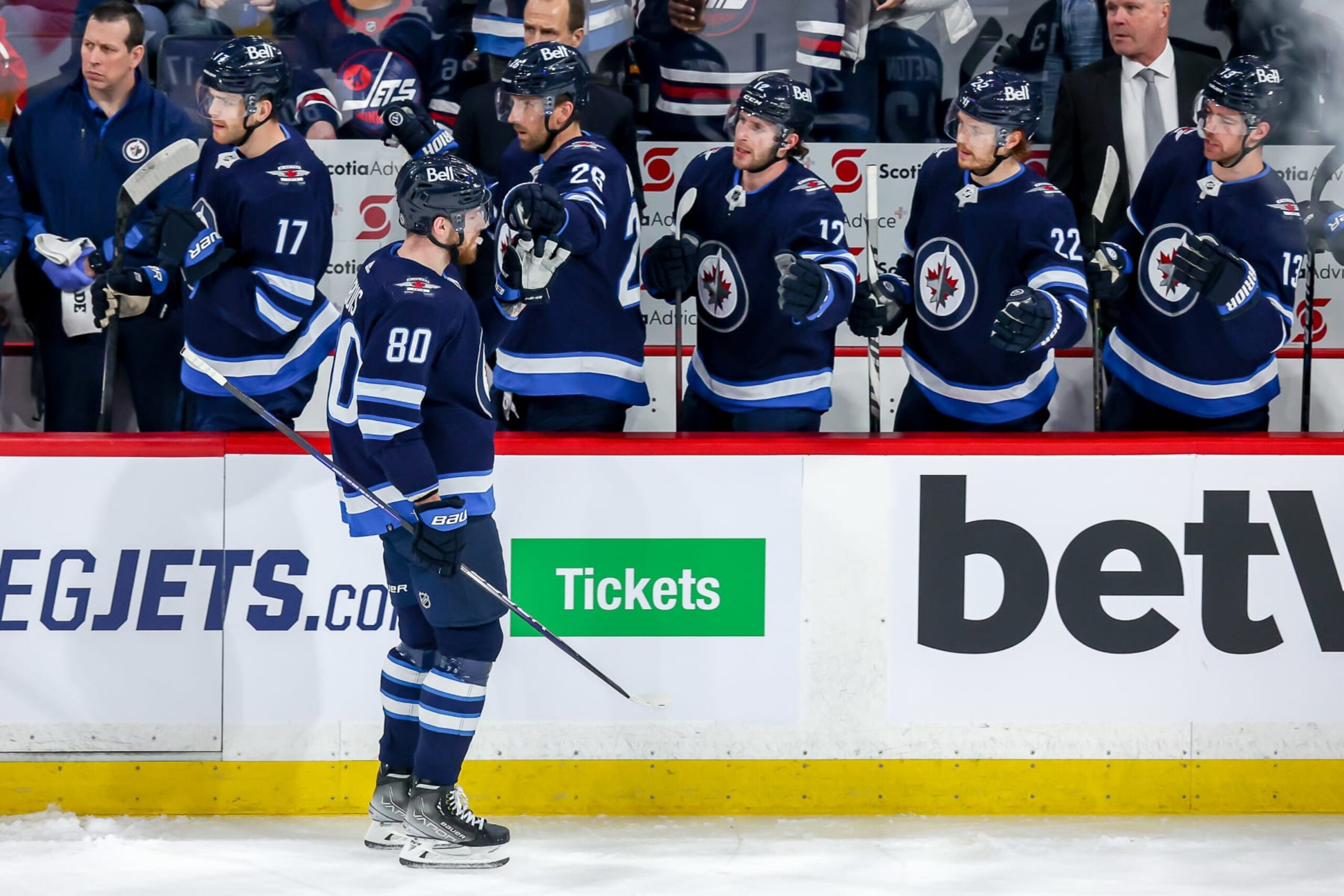 WINNIPEG, MB - APRIL 27: Pierre-Luc Dubois #80 of the Winnipeg Jets celebrates his first period goal against the Philadelphia Flyers with teammates at the bench at the Canada Life Centre on April 27, 2022 in Winnipeg, Manitoba, Canada. (Photo by Jonathan Kozub/NHLI via Getty Images)