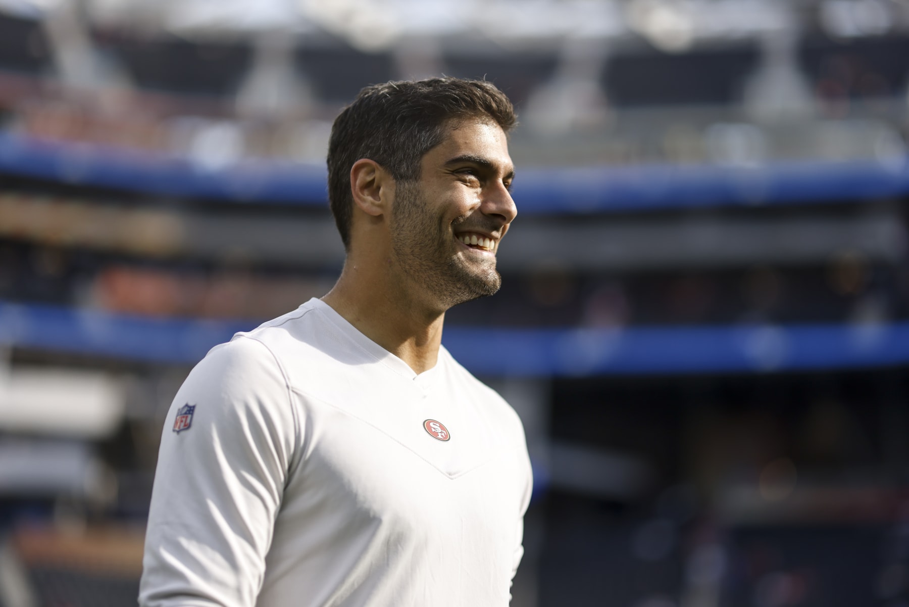 INGLEWOOD, CALIFORNIA - JANUARY 30: Jimmy Garoppolo #10 of the San Francisco 49ers reacts as he warms up prior to the NFC Championship NFL football game against the Los Angeles Rams at SoFi Stadium on January 30, 2022 in Inglewood, California. The Rams won 20-17 to advance to the Super Bowl. (Photo by Michael Owens/Getty Images)